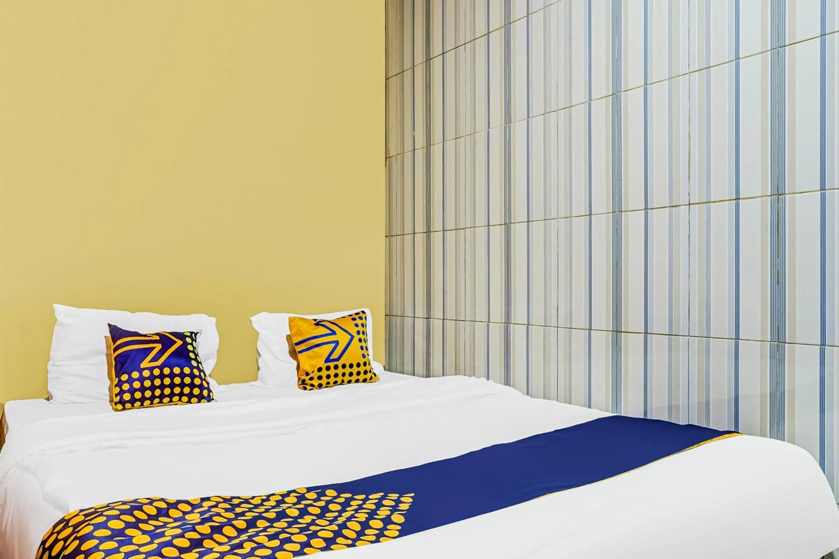 Bedroom in SPOT ON 91186 Losmen Yanti