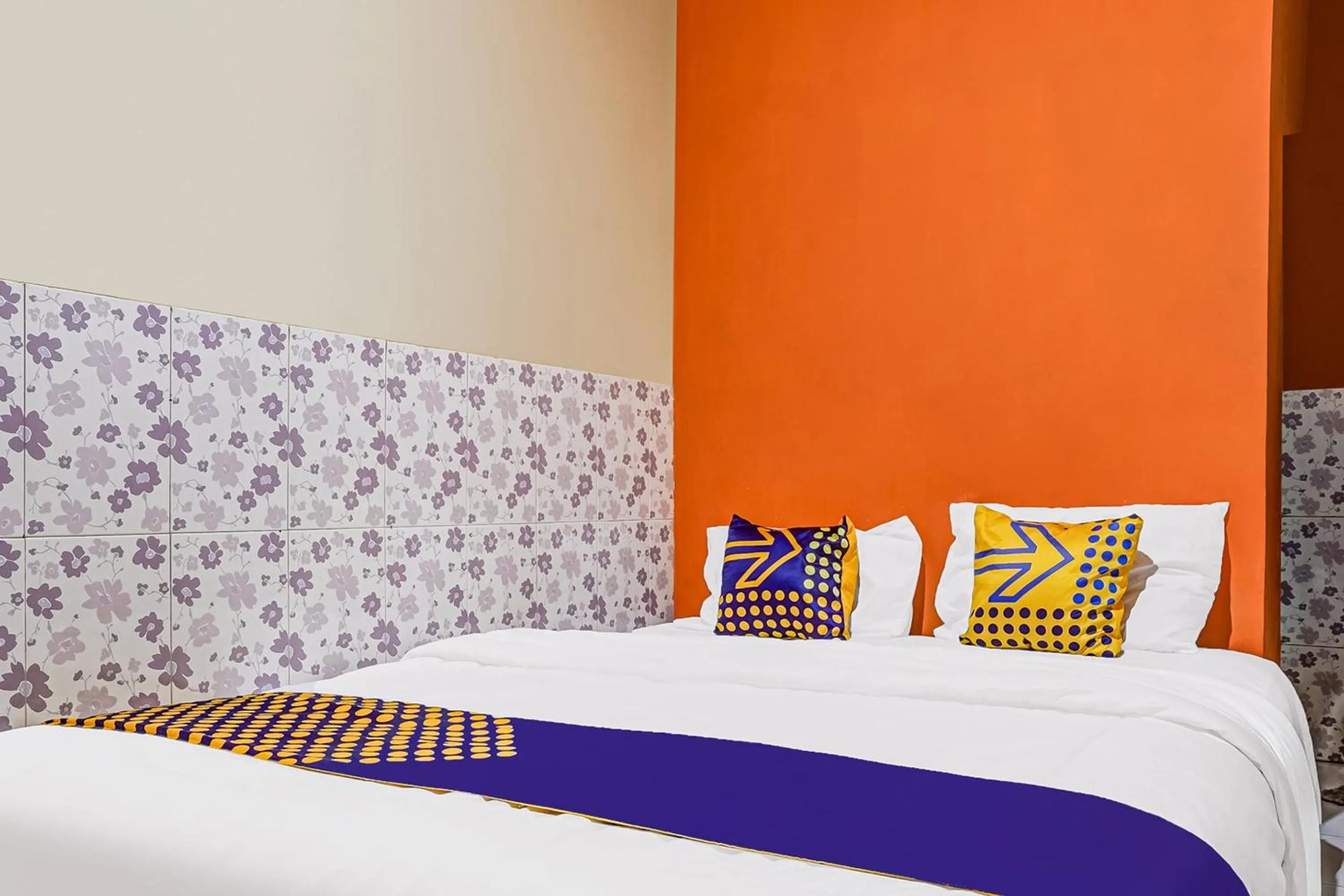 Bedroom in SPOT ON 91186 Losmen Yanti