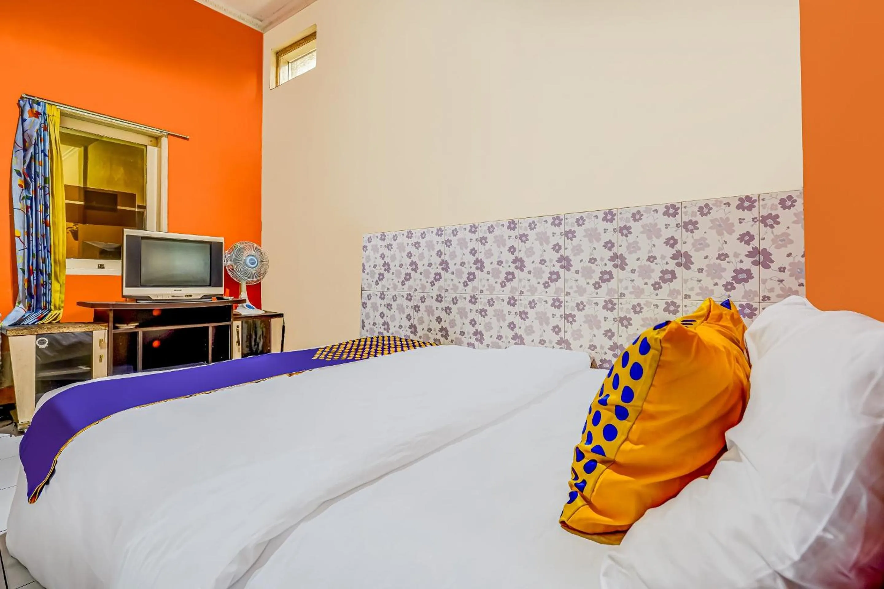 Bedroom in SPOT ON 91186 Losmen Yanti