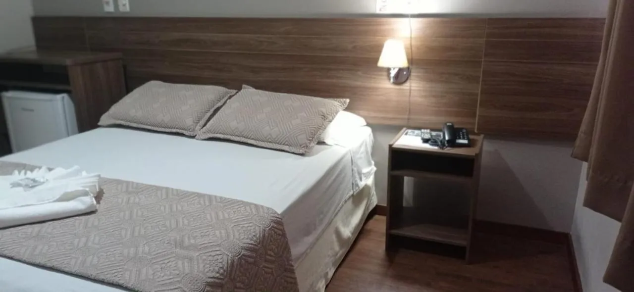 Bed in CAMBRAIA HOTEL ARCOS