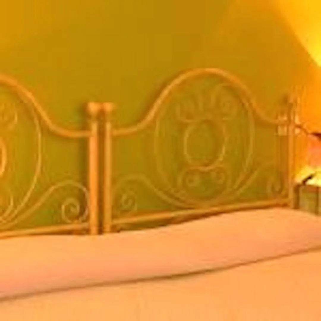 Bed in Hotel Valkarana Country Relais