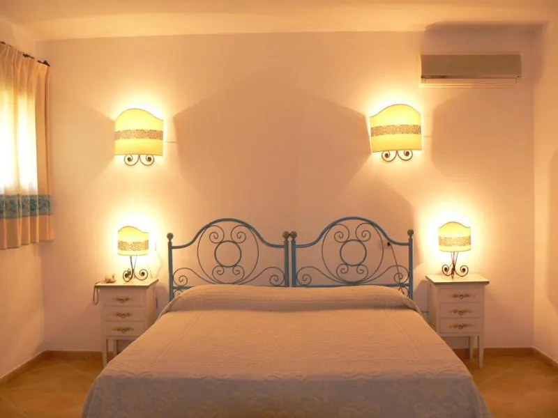 Bed in Hotel Valkarana Country Relais