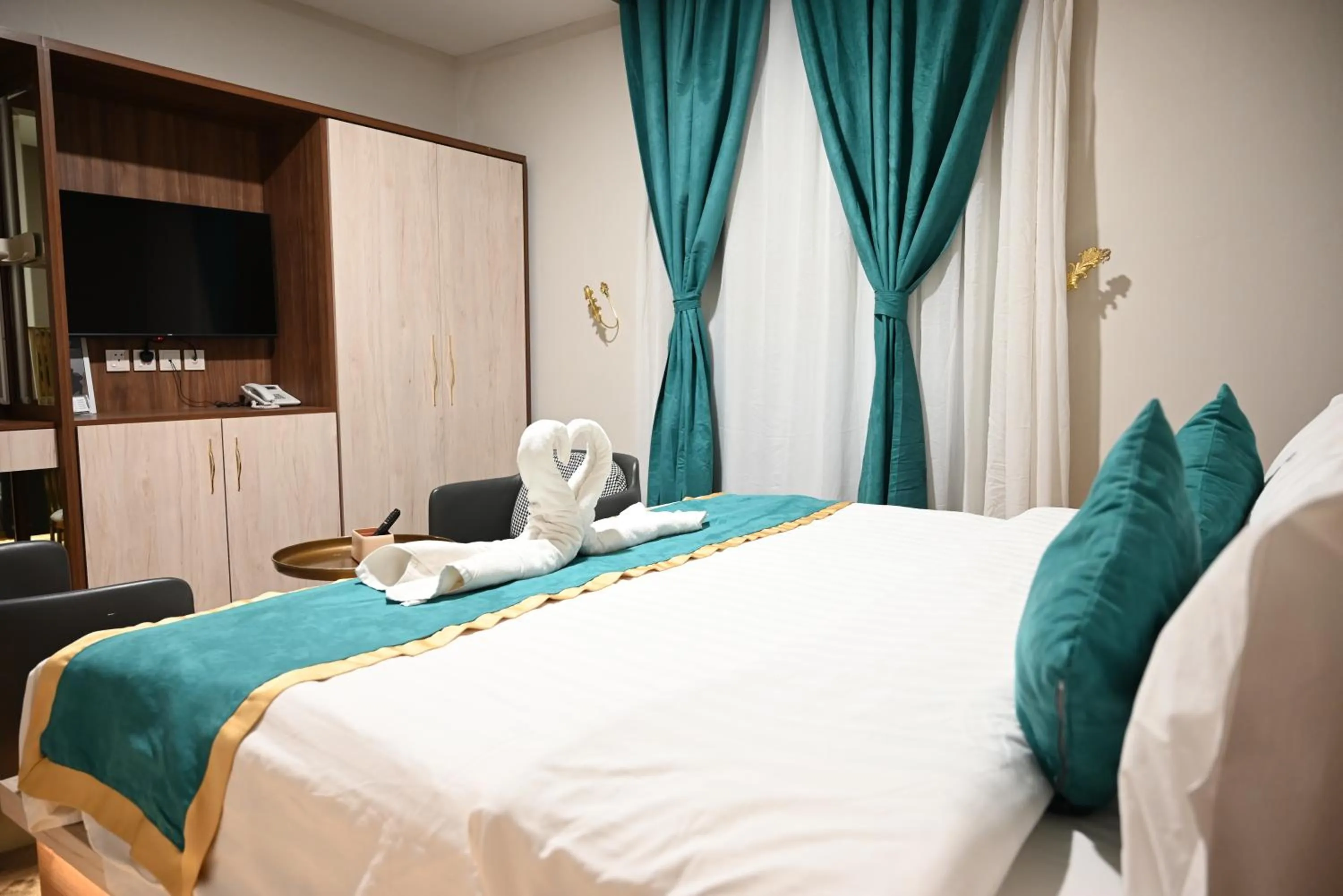 Bed in Relax Palace Hotel Apartments