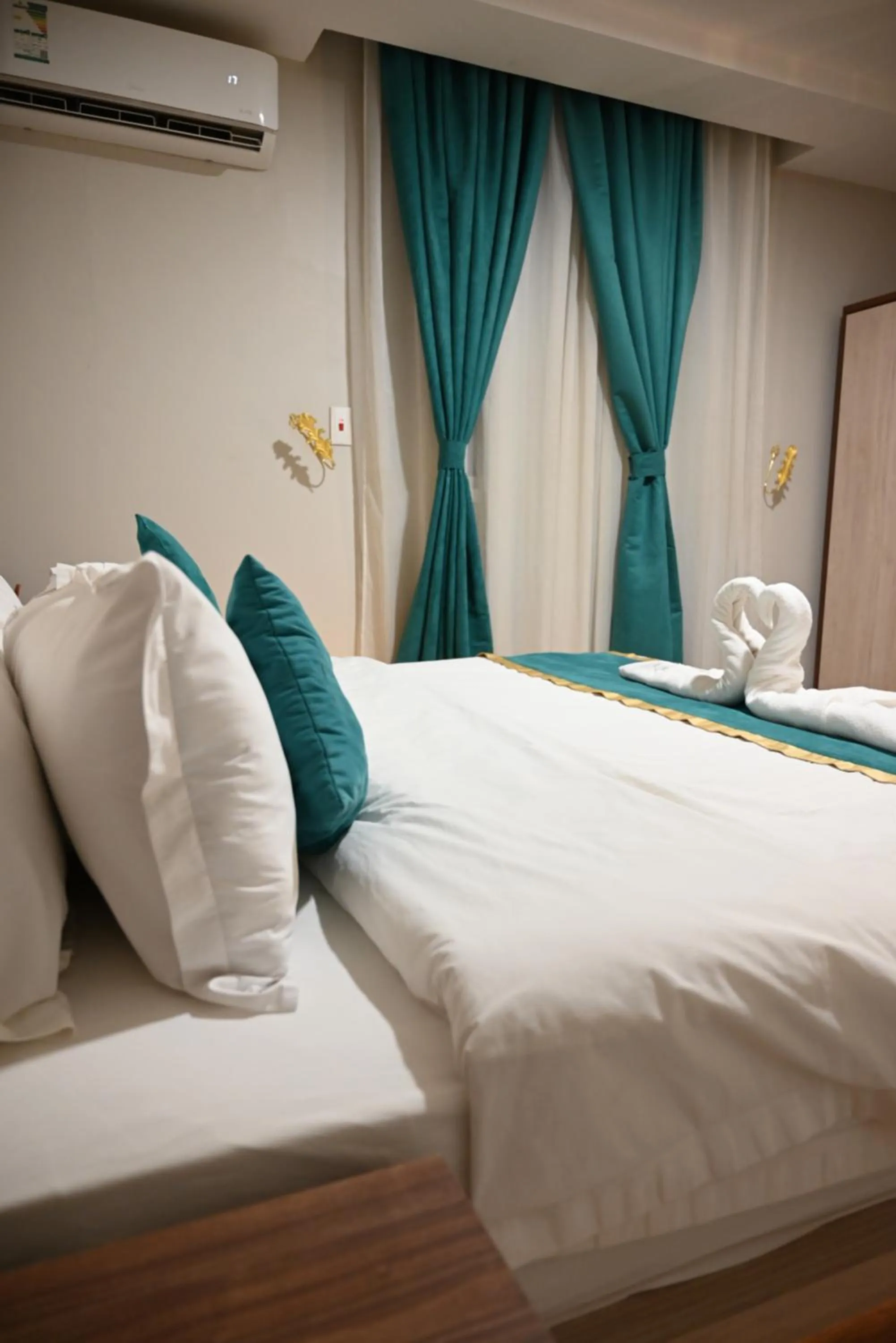 Bed in Relax Palace Hotel Apartments