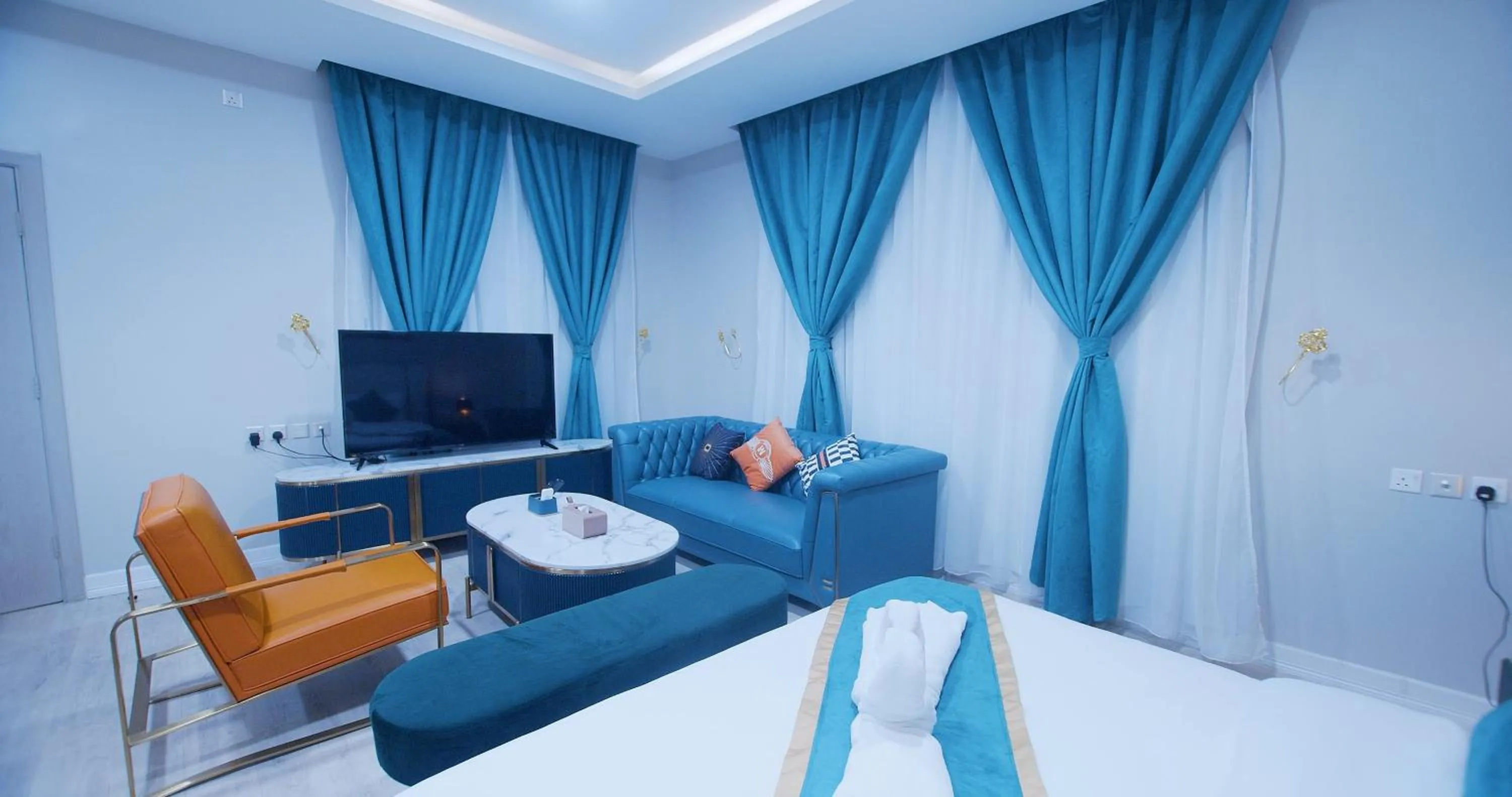 Seating area, Bed in Relax Palace Hotel Apartments