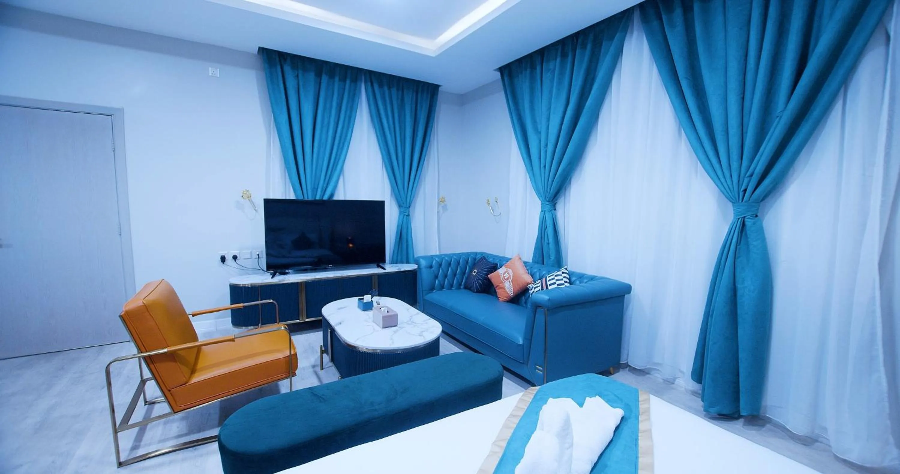 Communal lounge/ TV room in Relax Palace Hotel Apartments