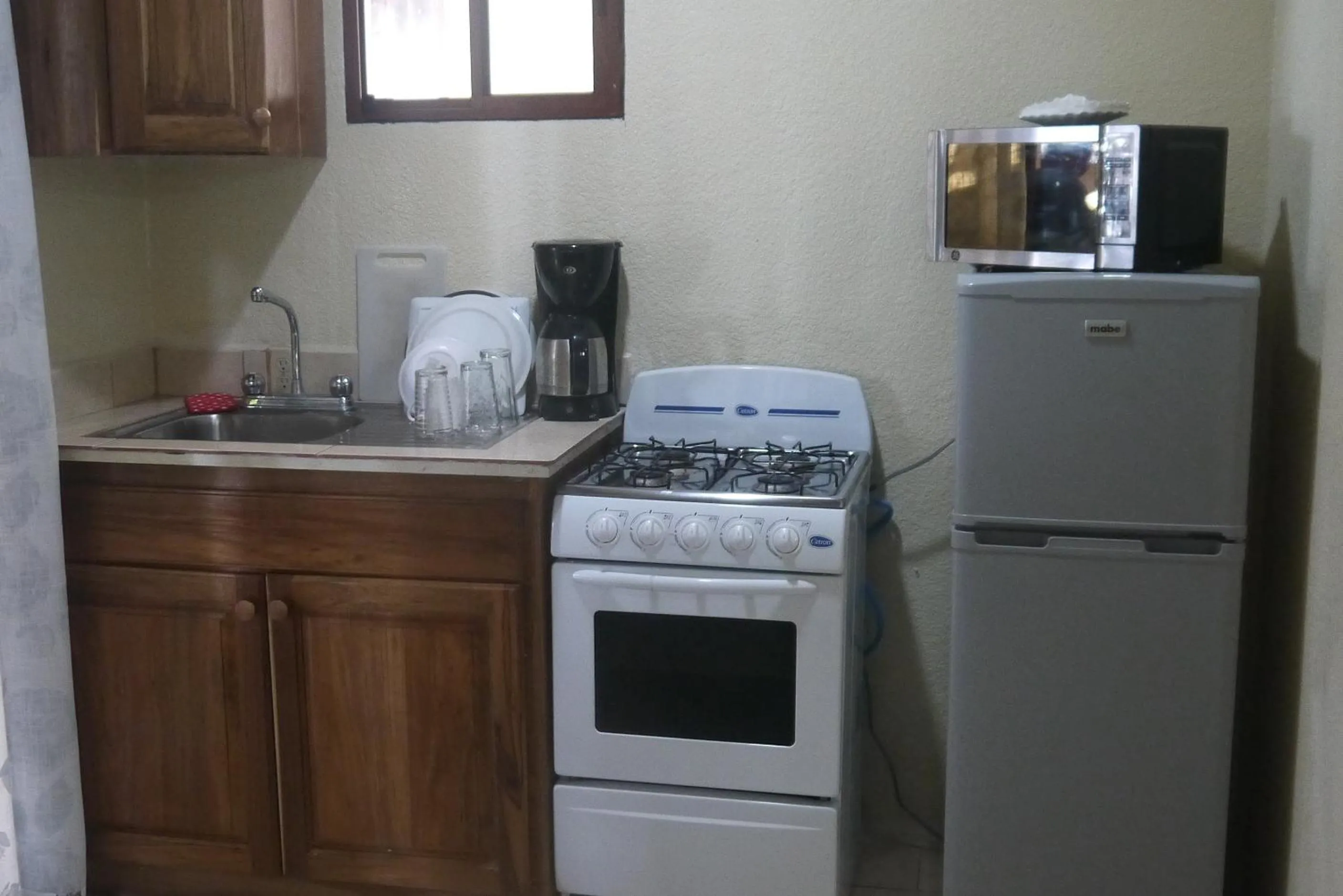 Kitchen or kitchenette in Fosters West Bay Resort