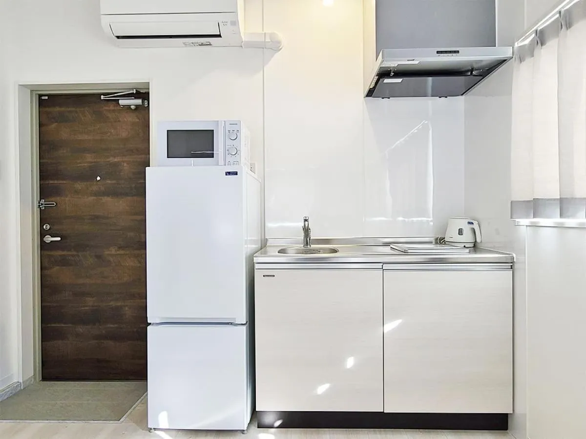 Kitchen or kitchenette in HOTEL Kuu