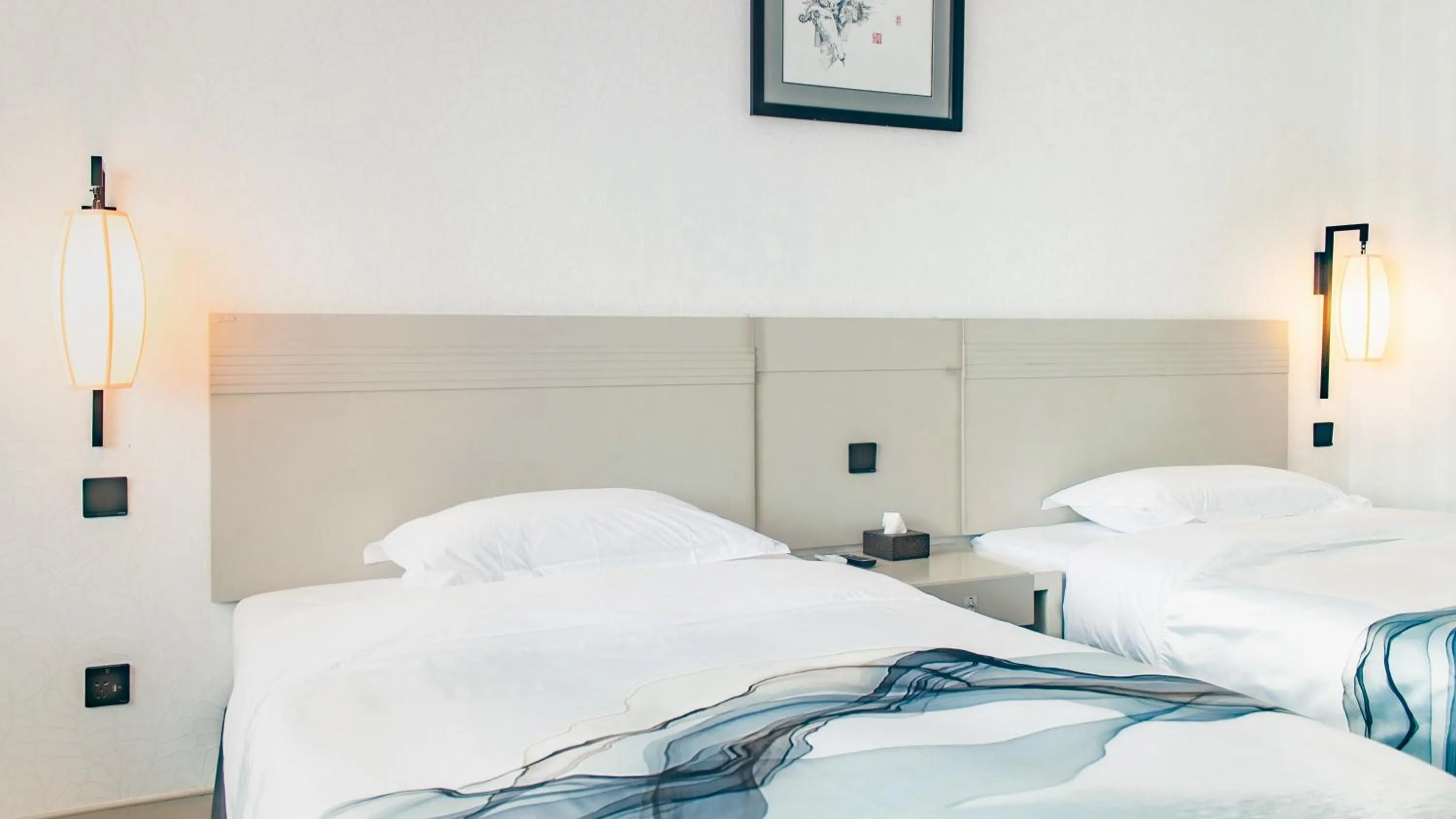 Bed in Huama SSAW Hotel Lijiang