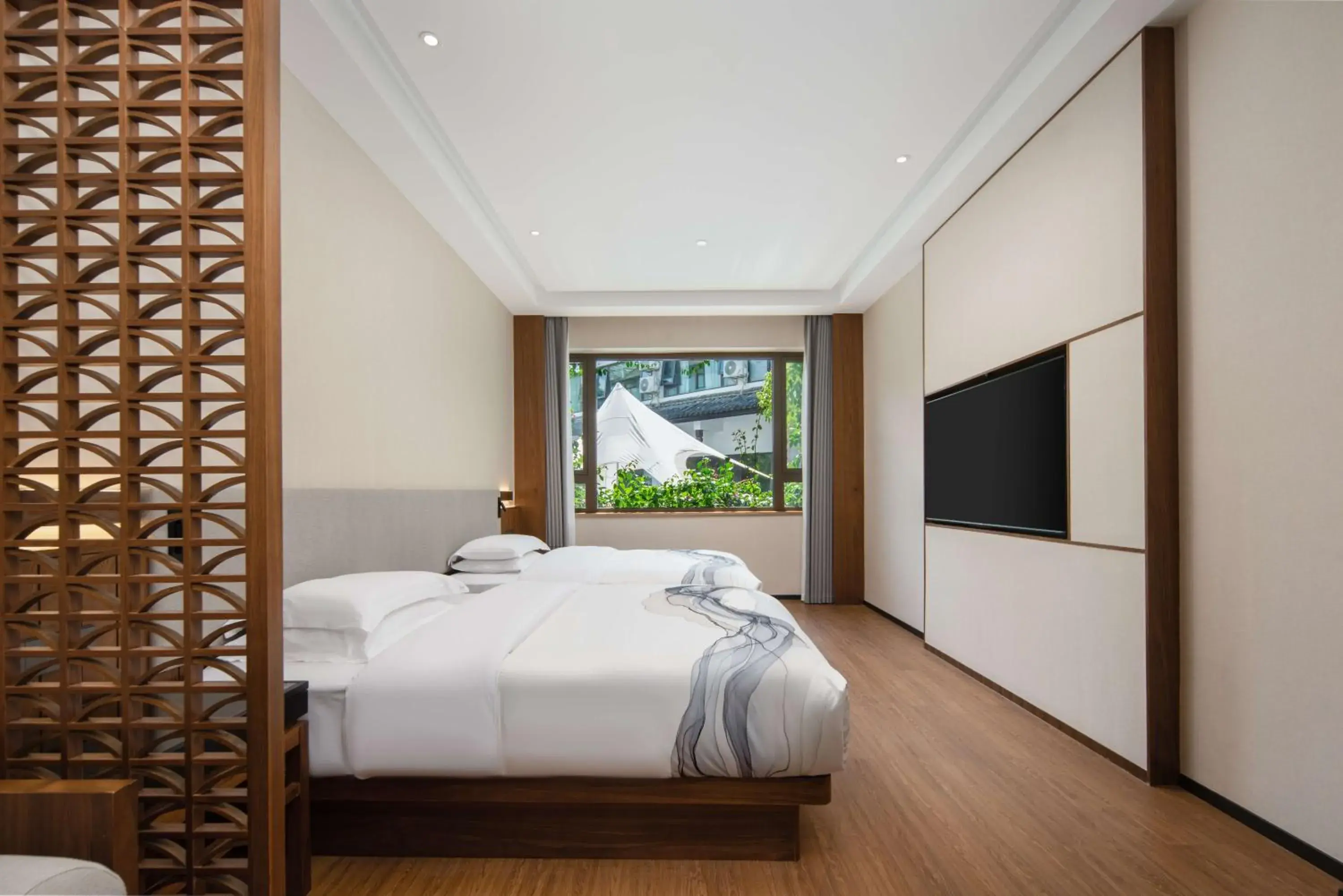 Twin Room with Garden View in Huama SSAW Hotel Lijiang Twin Room with Garden View in Huama SSAW Hotel Lijiang