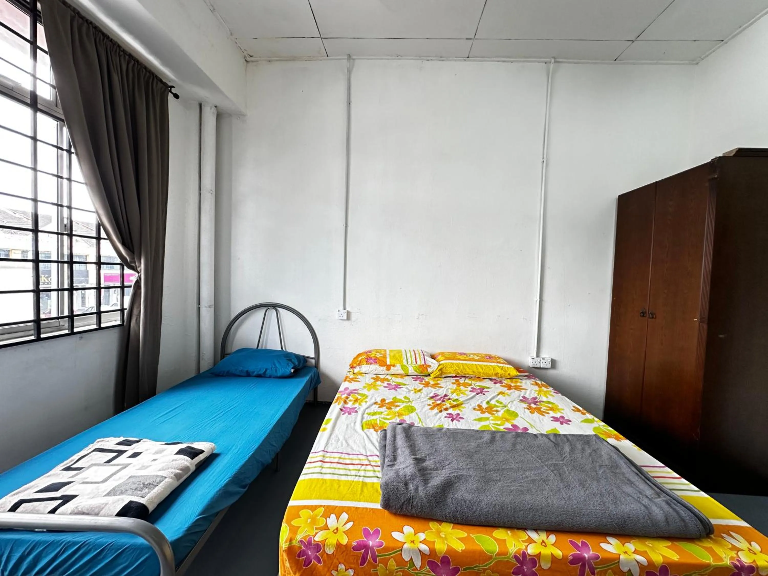 Bed in Jiaxin Dormitory - Puteri Wangsa 家馨旅舍