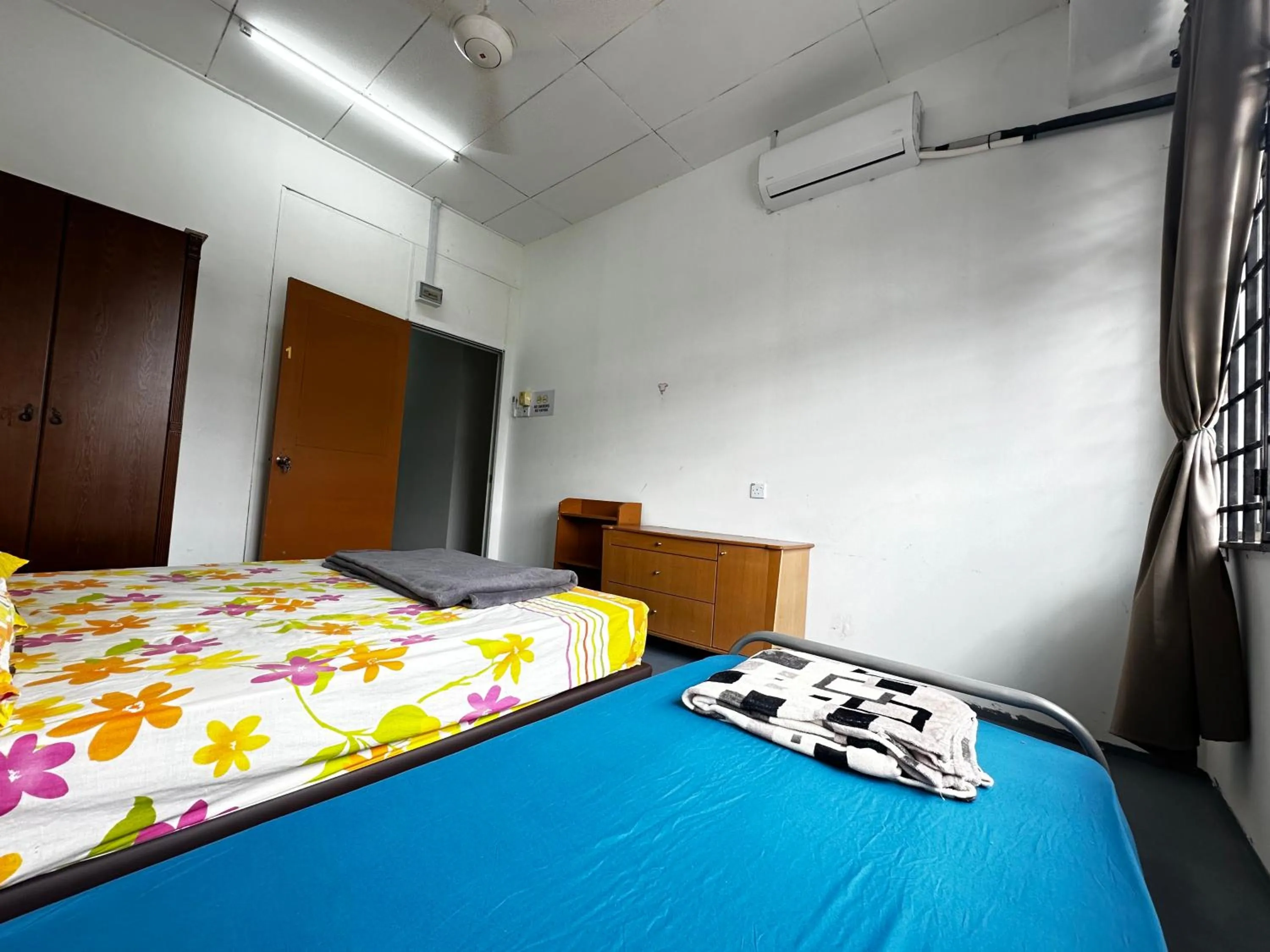 Bed in Jiaxin Dormitory - Puteri Wangsa 家馨旅舍