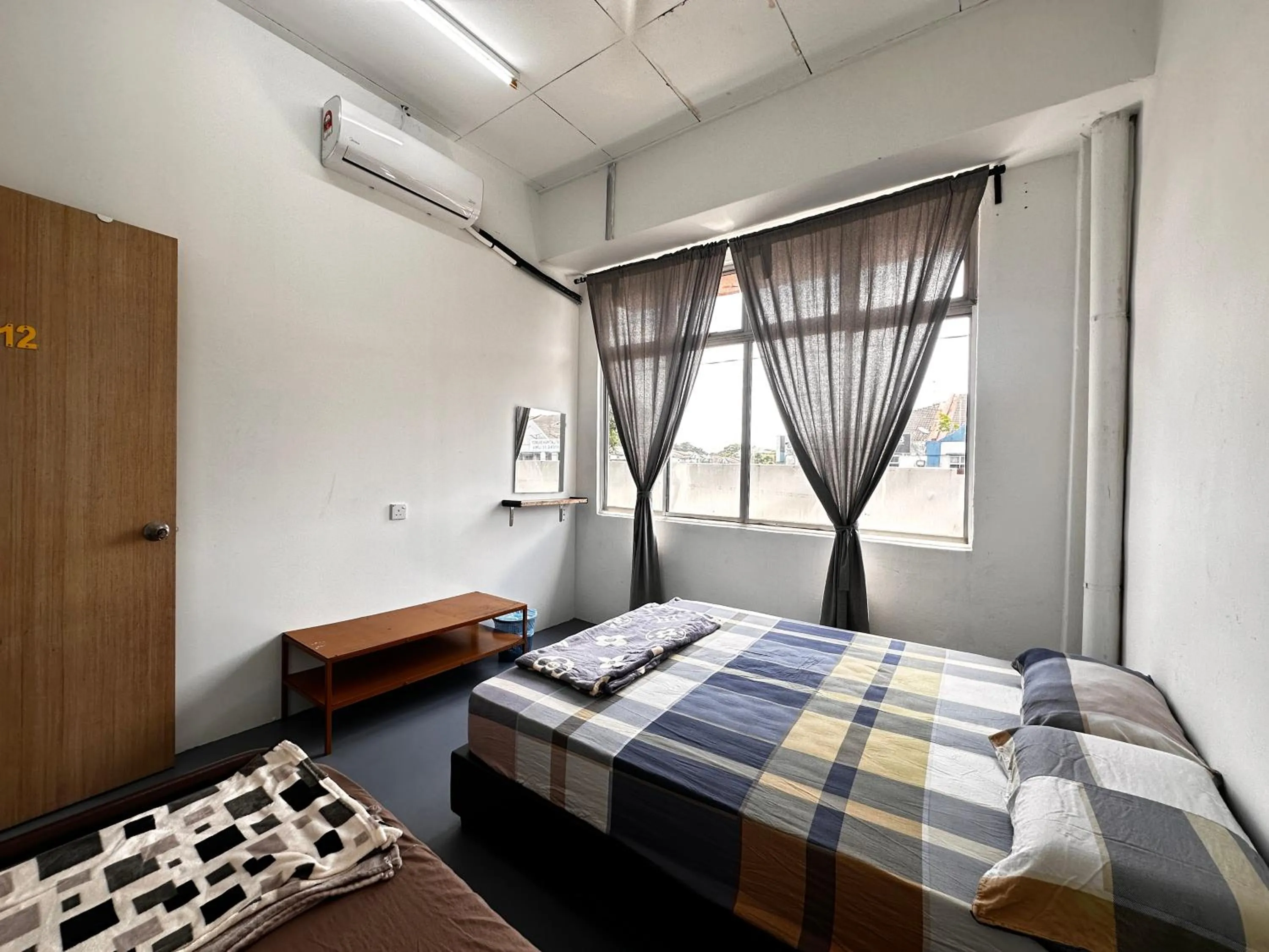 Bed in Jiaxin Dormitory - Puteri Wangsa 家馨旅舍