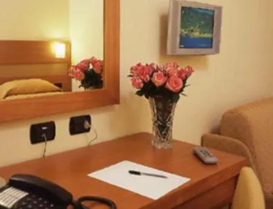 Seating area, Bed in Hotel Moscatello