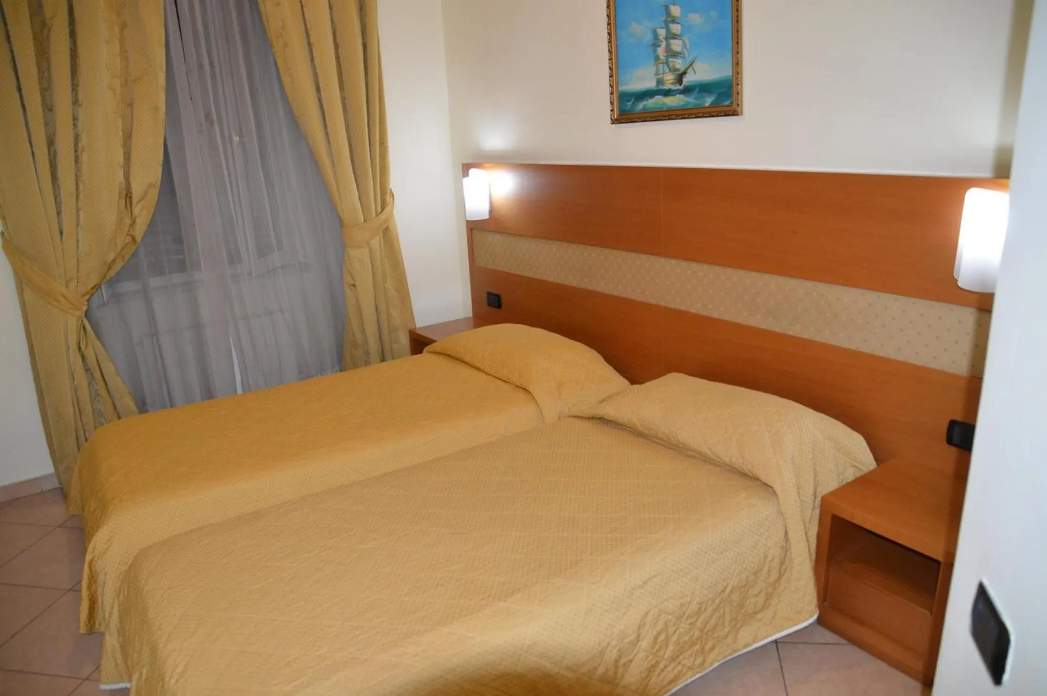Bed in Hotel Moscatello