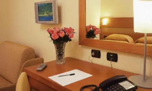 Seating area, Bed in Hotel Moscatello