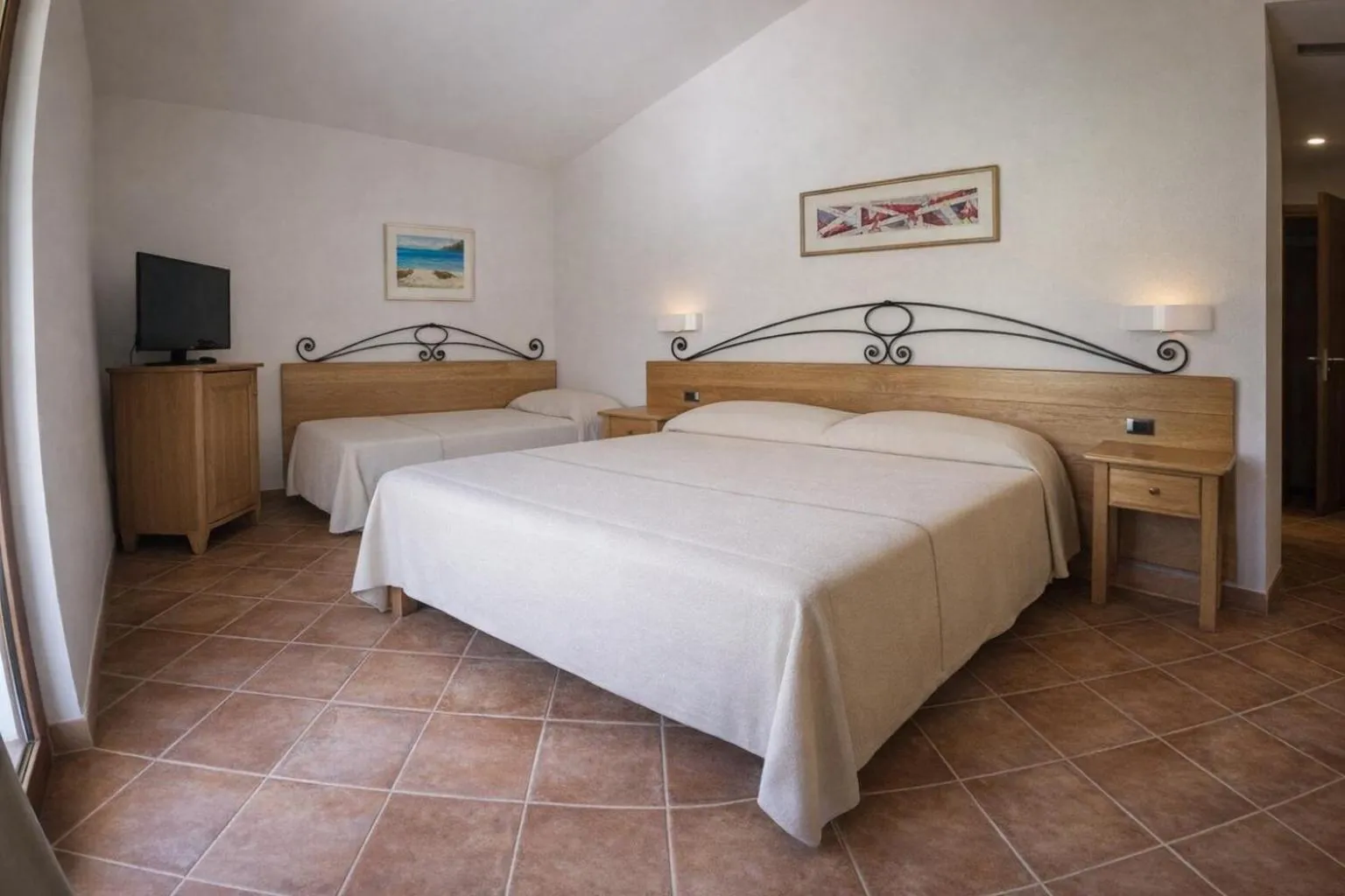 Bed in Hotel Villa Gustui Maris