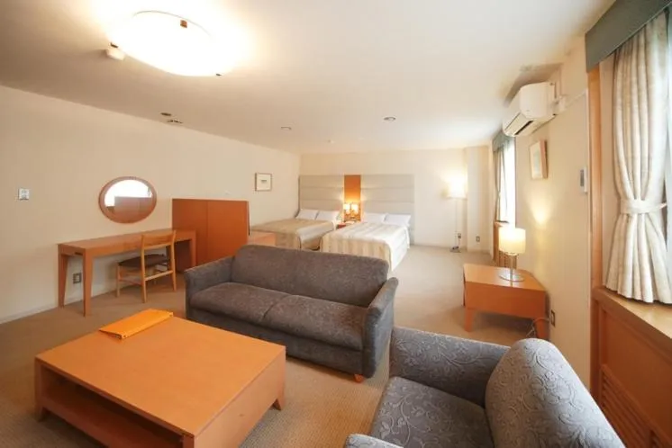 Bed in Tabist Hotel Colosseum Inn Tateshina