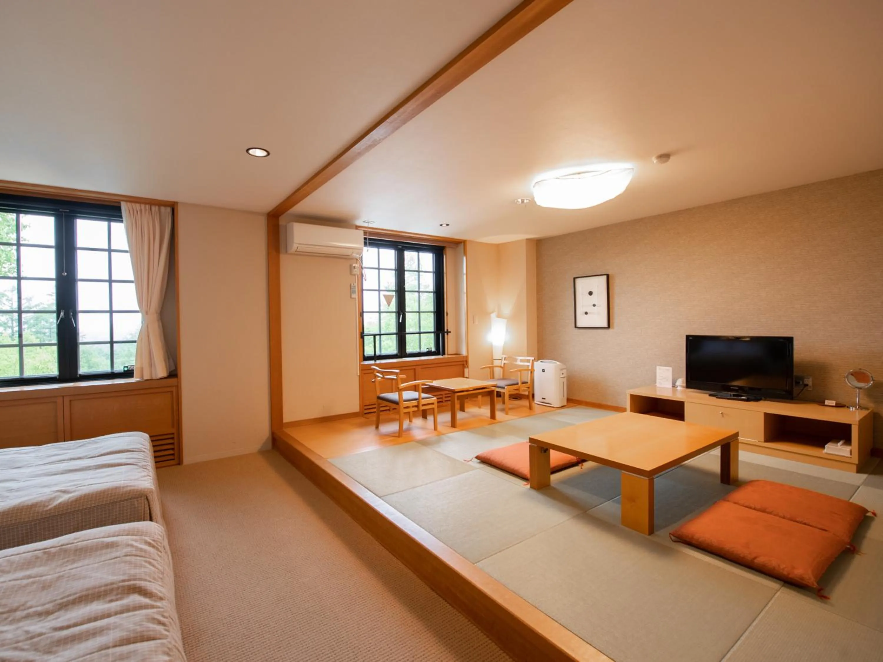 Bed in Tabist Hotel Colosseum Inn Tateshina