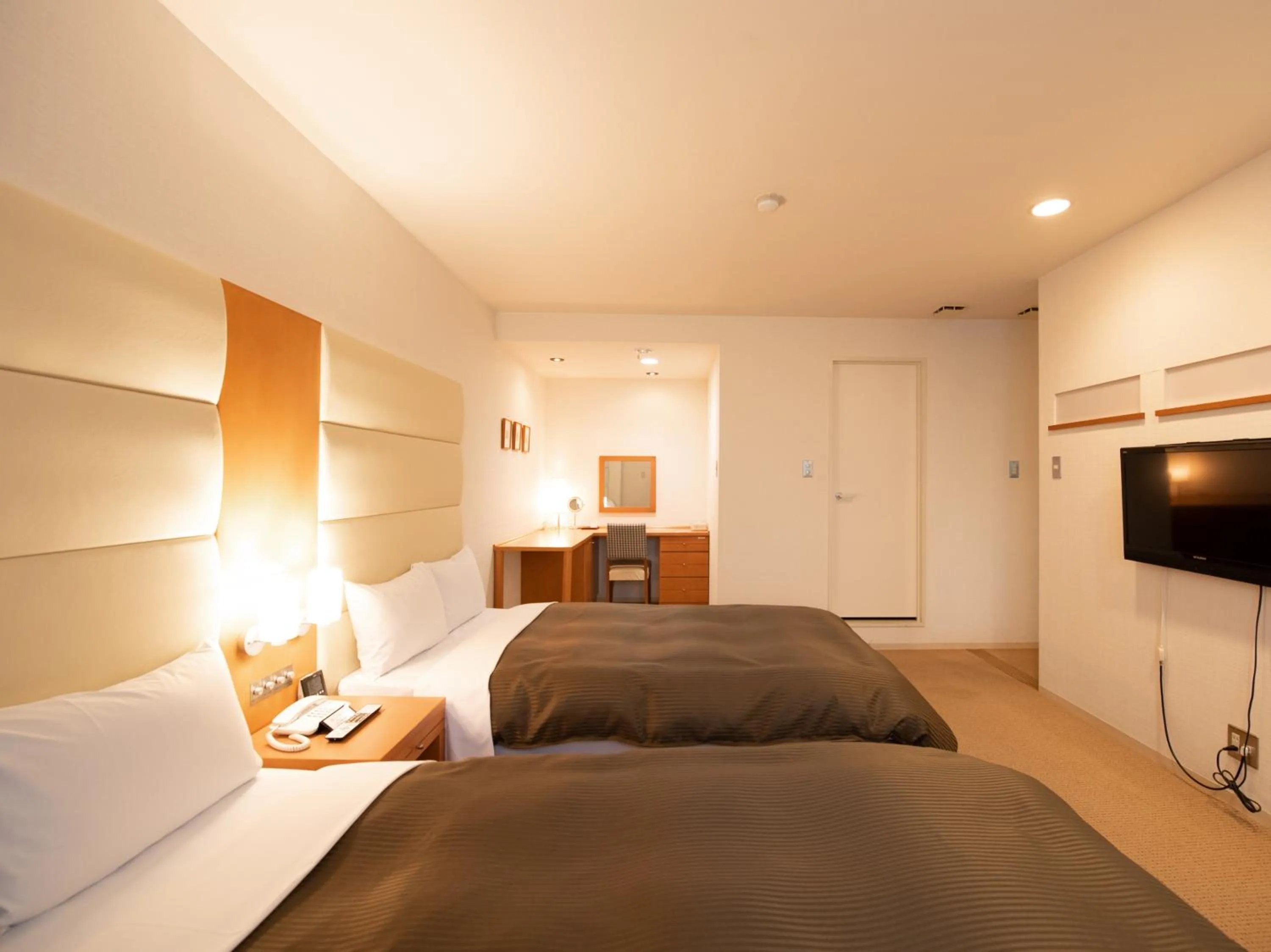 Bed in Tabist Hotel Colosseum Inn Tateshina