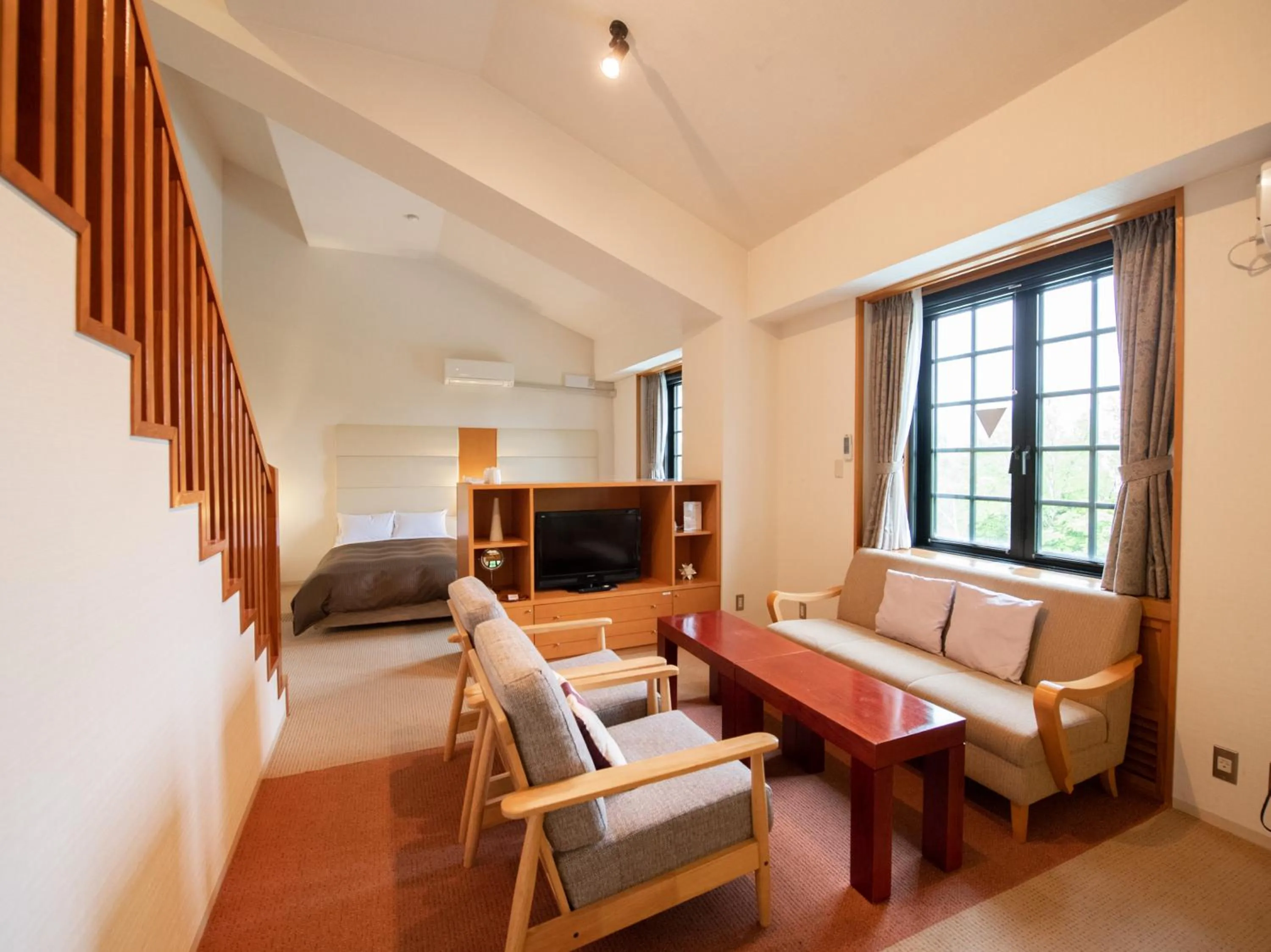 Photo of the whole room, Bed in Tabist Hotel Colosseum Inn Tateshina