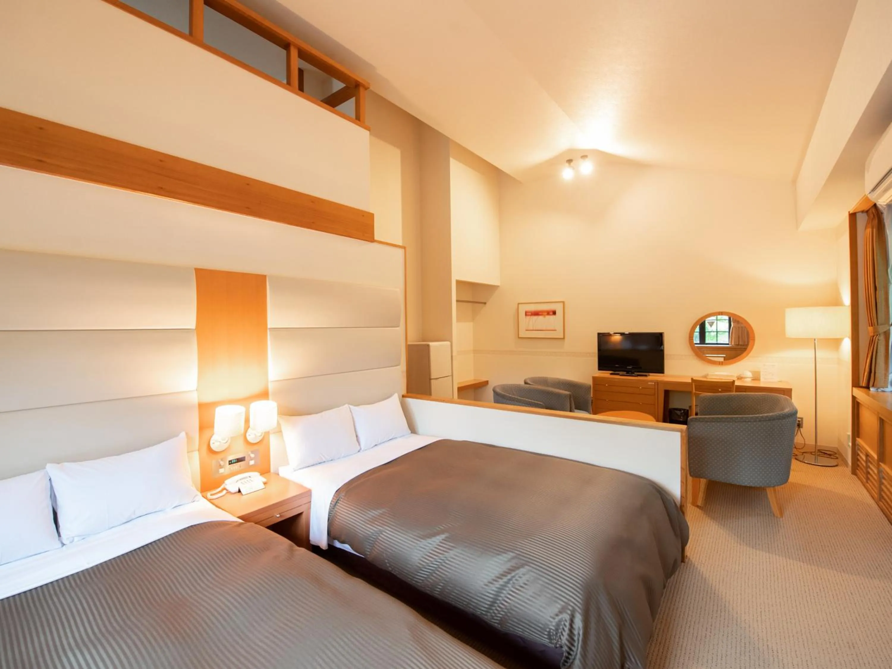 Bed in Tabist Hotel Colosseum Inn Tateshina