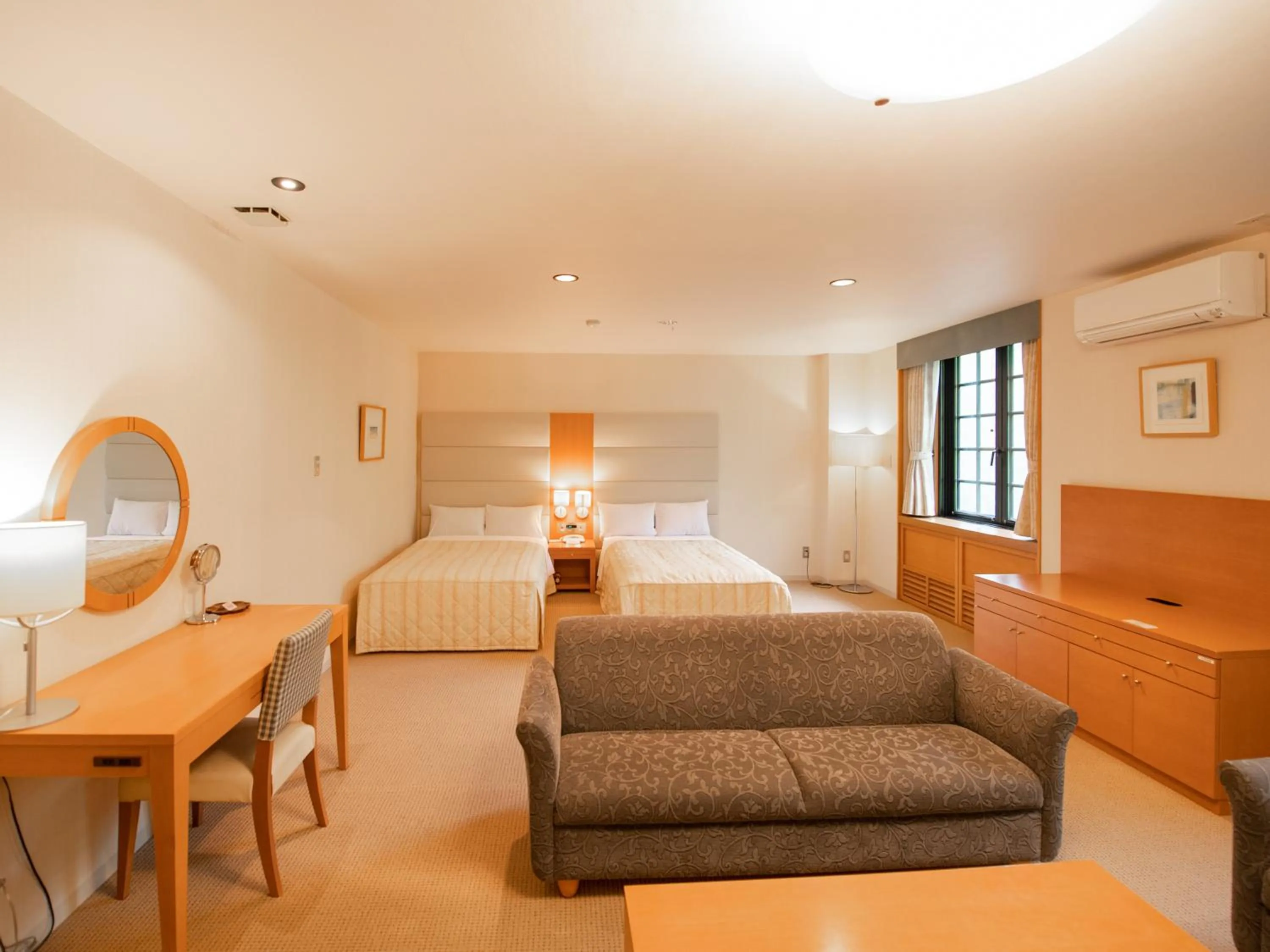 Bed in Tabist Hotel Colosseum Inn Tateshina