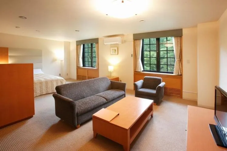 Photo of the whole room, Bed in Tabist Hotel Colosseum Inn Tateshina