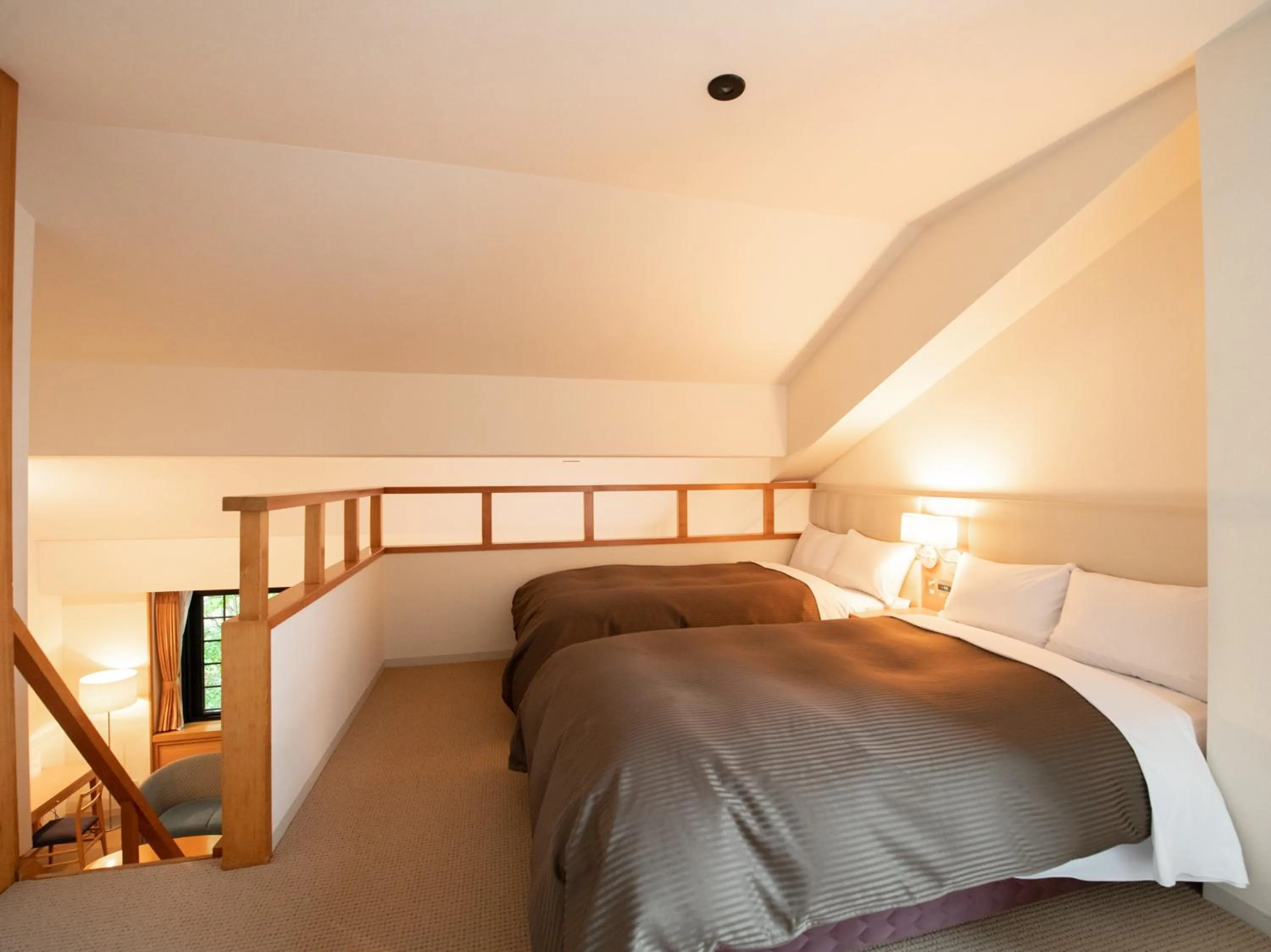 Bed in Tabist Hotel Colosseum Inn Tateshina