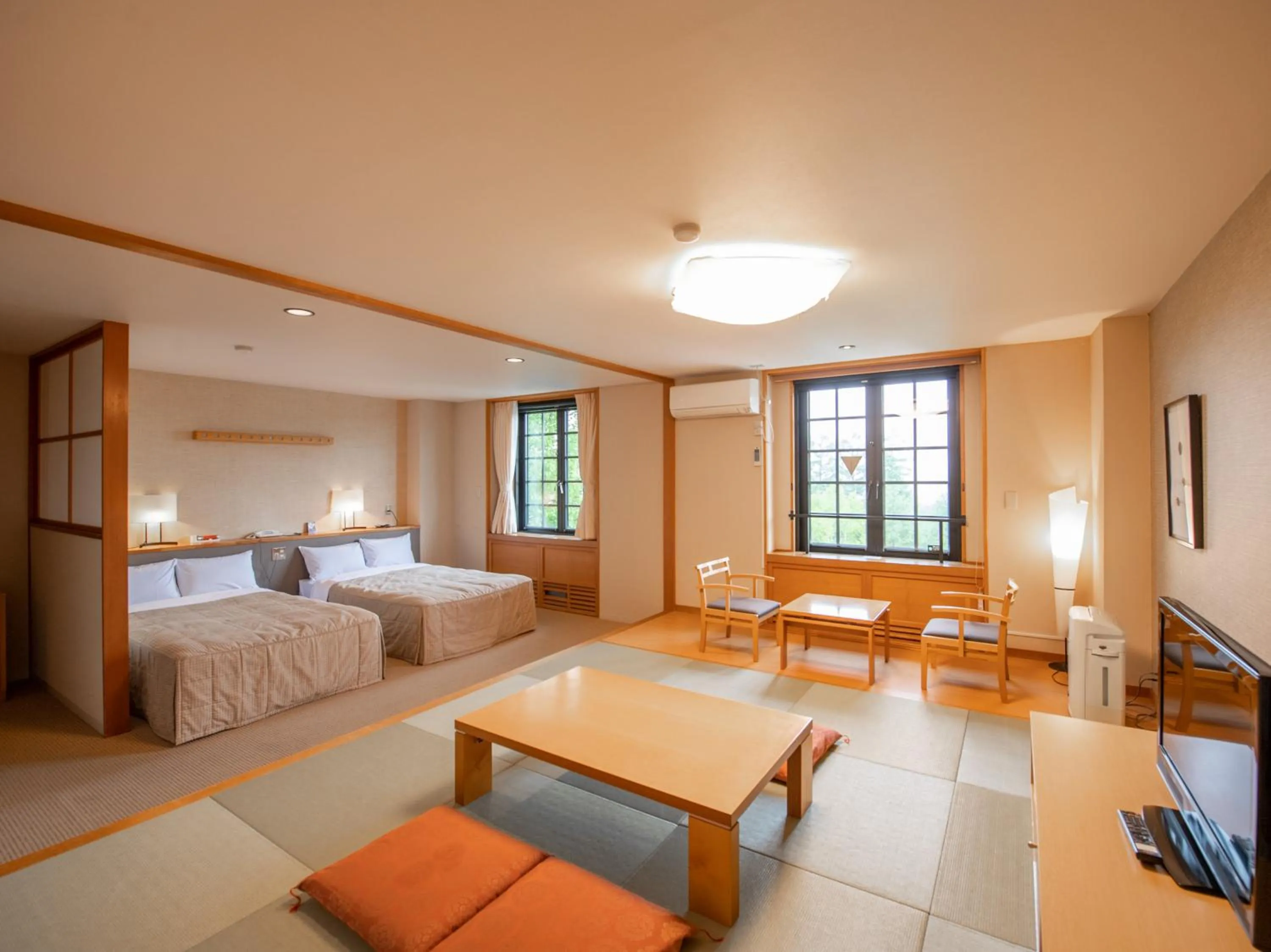 Photo of the whole room, Bed in Tabist Hotel Colosseum Inn Tateshina