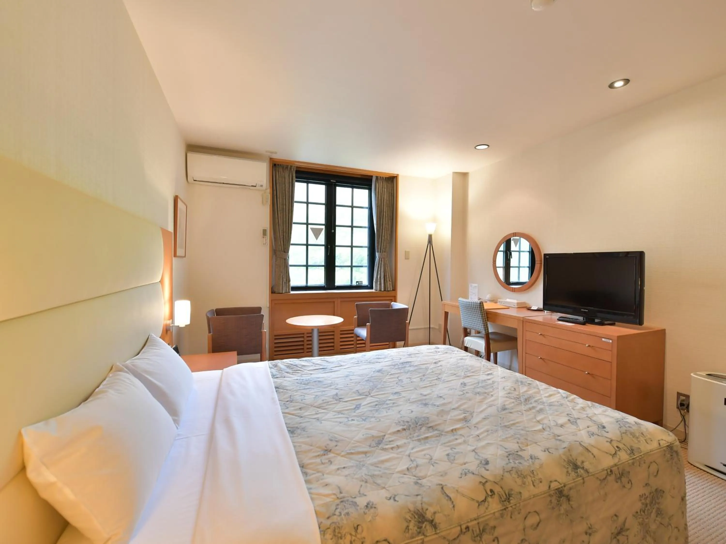 Bed in Tabist Hotel Colosseum Inn Tateshina