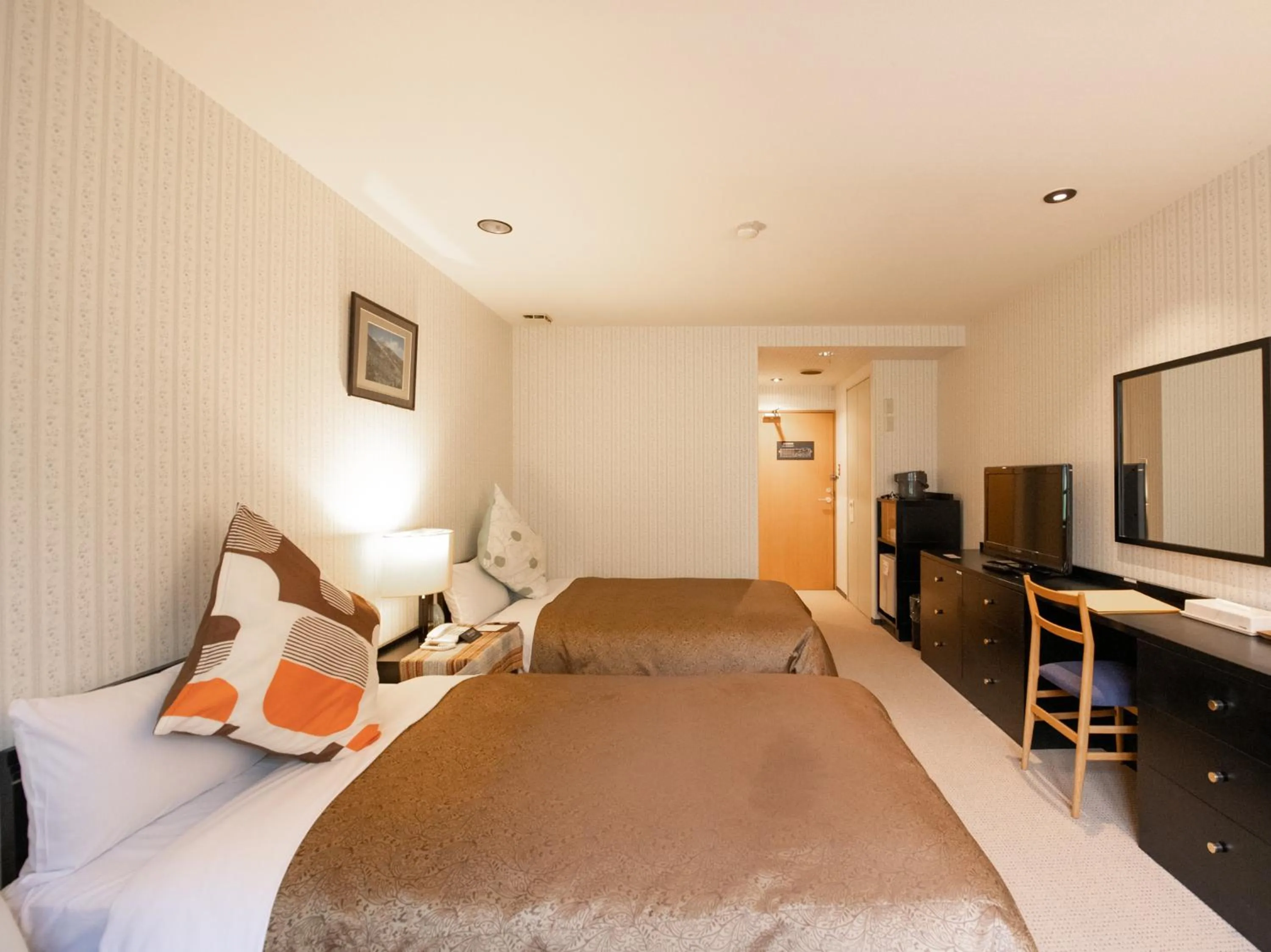 Bed in Tabist Hotel Colosseum Inn Tateshina