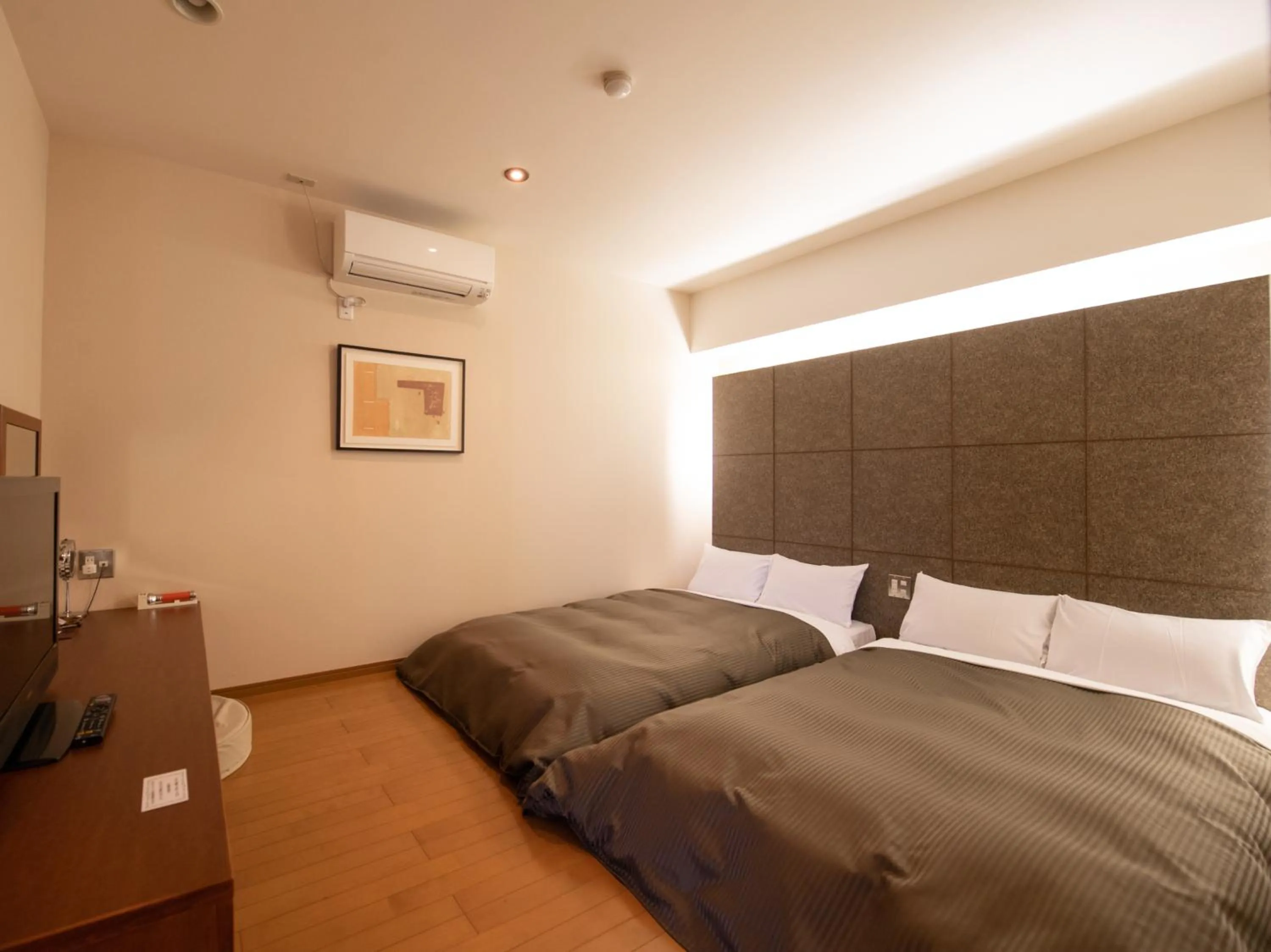 Bed in Tabist Hotel Colosseum Inn Tateshina