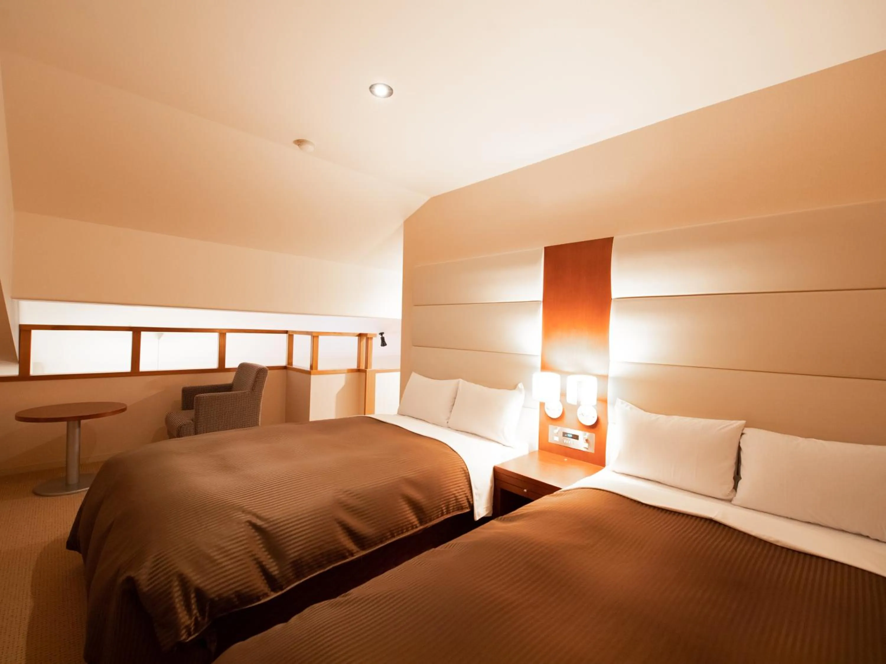 Bed in Tabist Hotel Colosseum Inn Tateshina