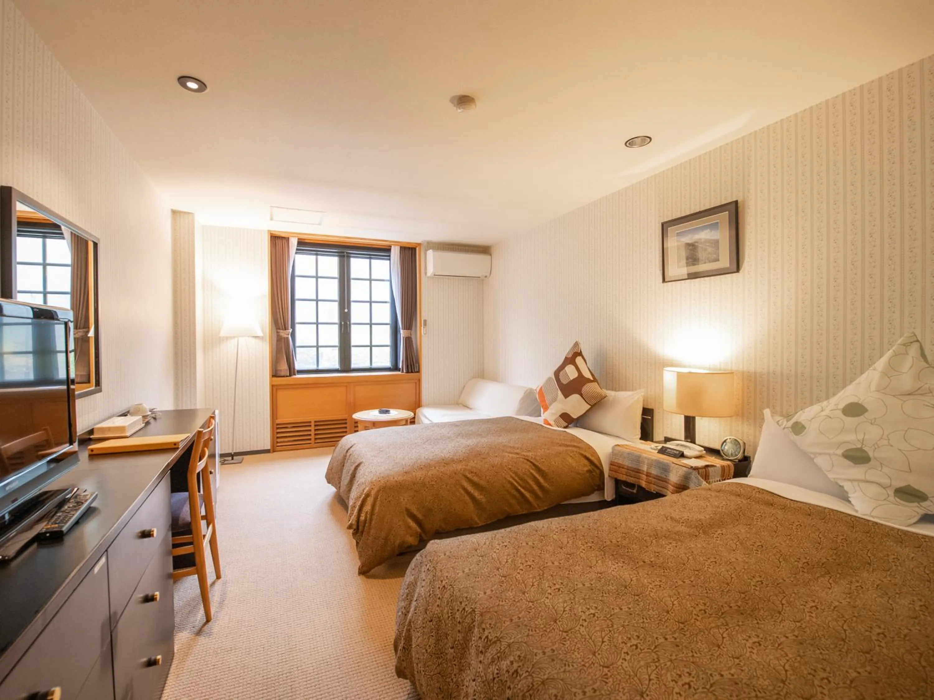 Photo of the whole room, Bed in Tabist Hotel Colosseum Inn Tateshina