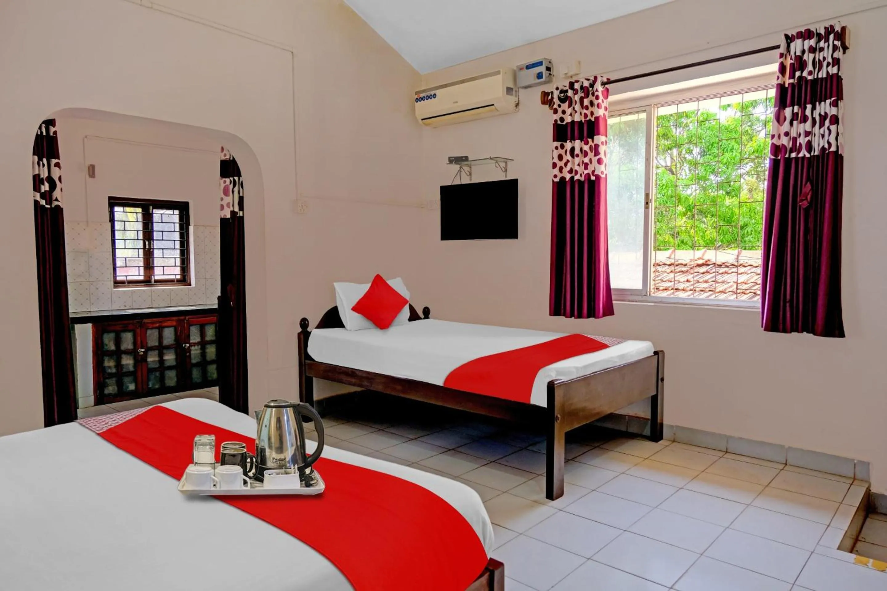 Bedroom in Hotel O Cathsil Cottages