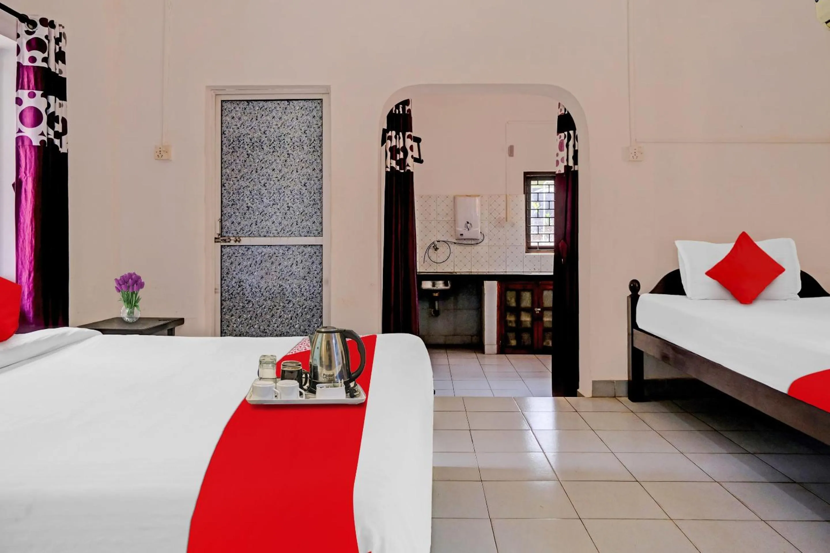 Bedroom in Hotel O Cathsil Cottages