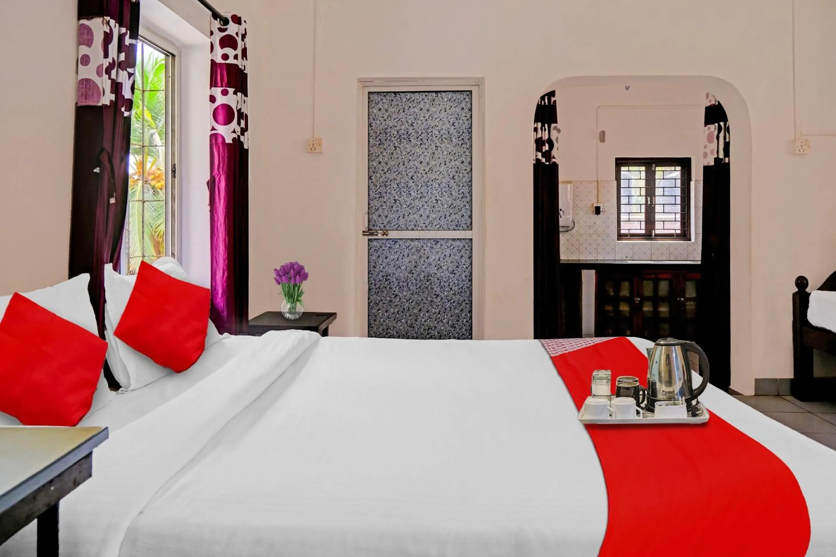 Bedroom in Hotel O Cathsil Cottages