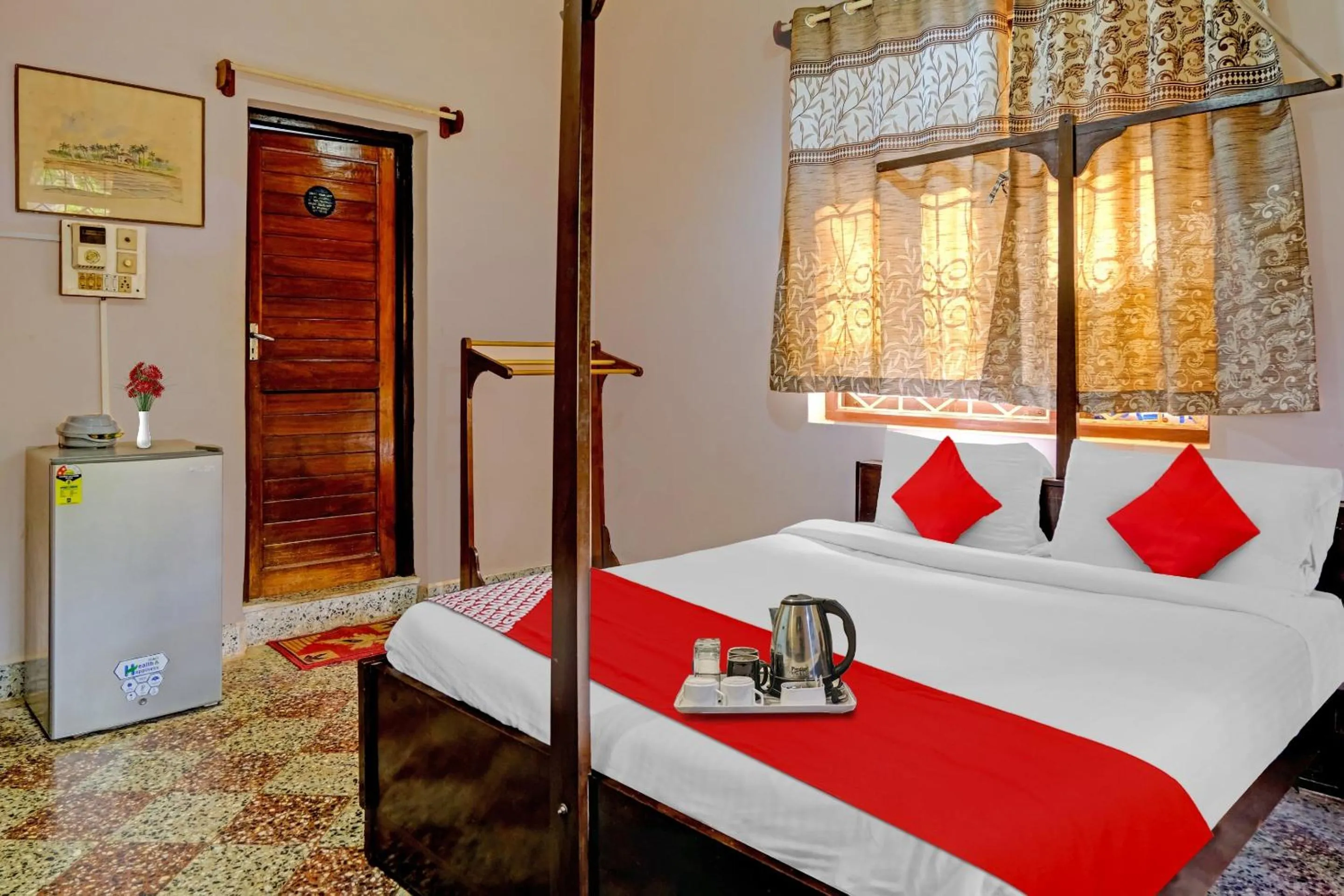 Bedroom in Hotel O Cathsil Cottages