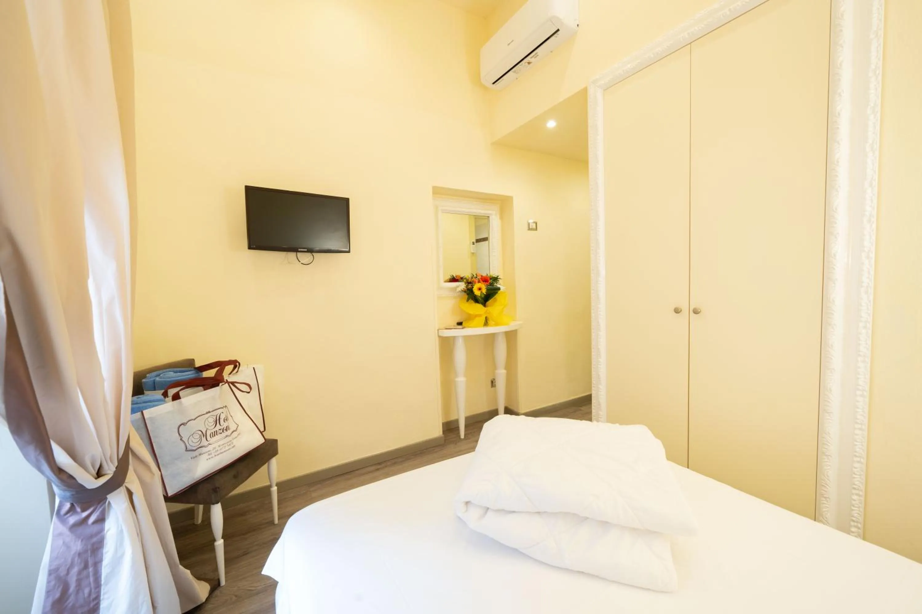 Bed in Hotel Manzoni Wellness&Spa