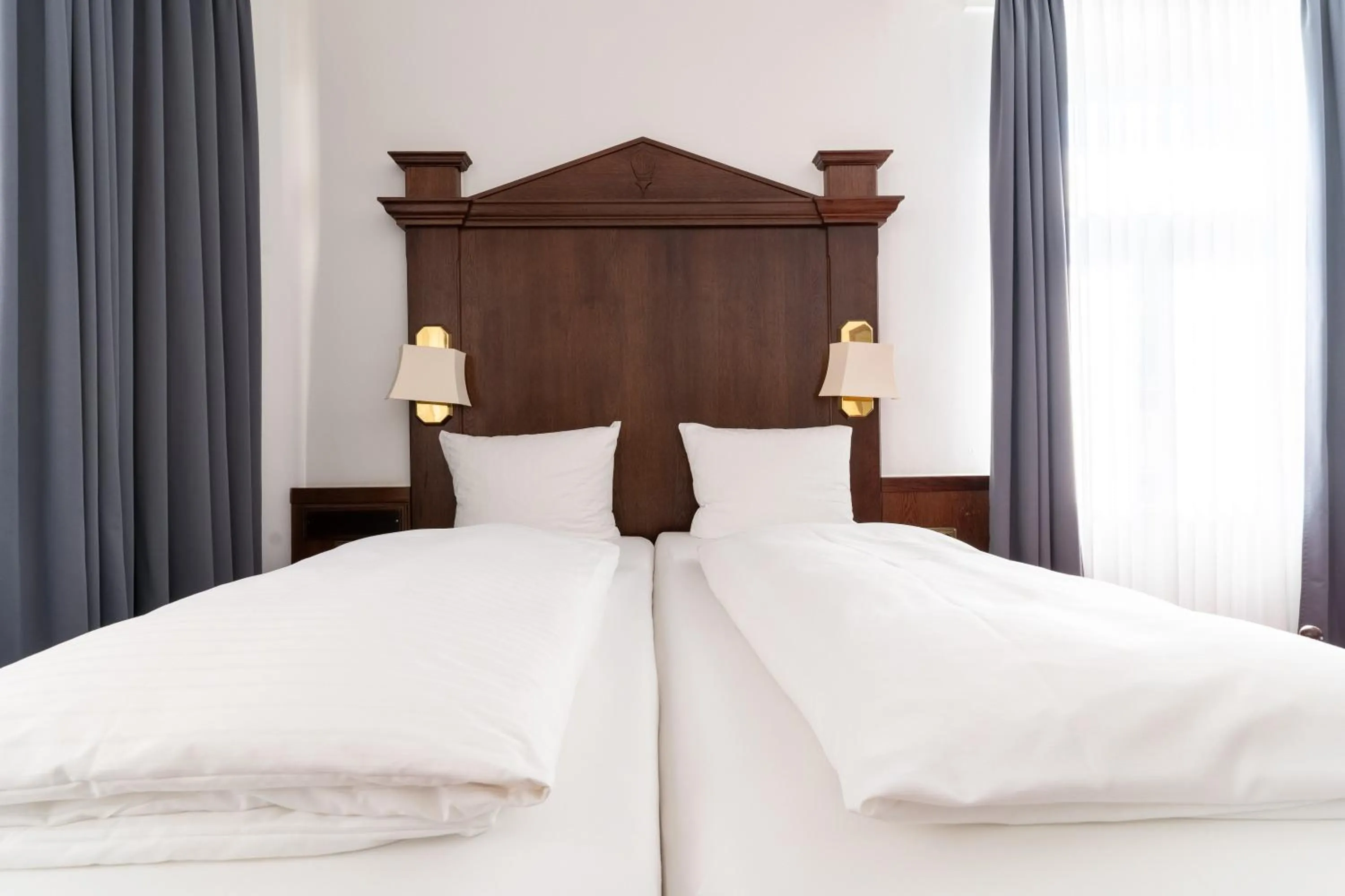 Bed in Hotel zum Ritter St Georg - Oldest Residential Building in Heidelberg since 1592