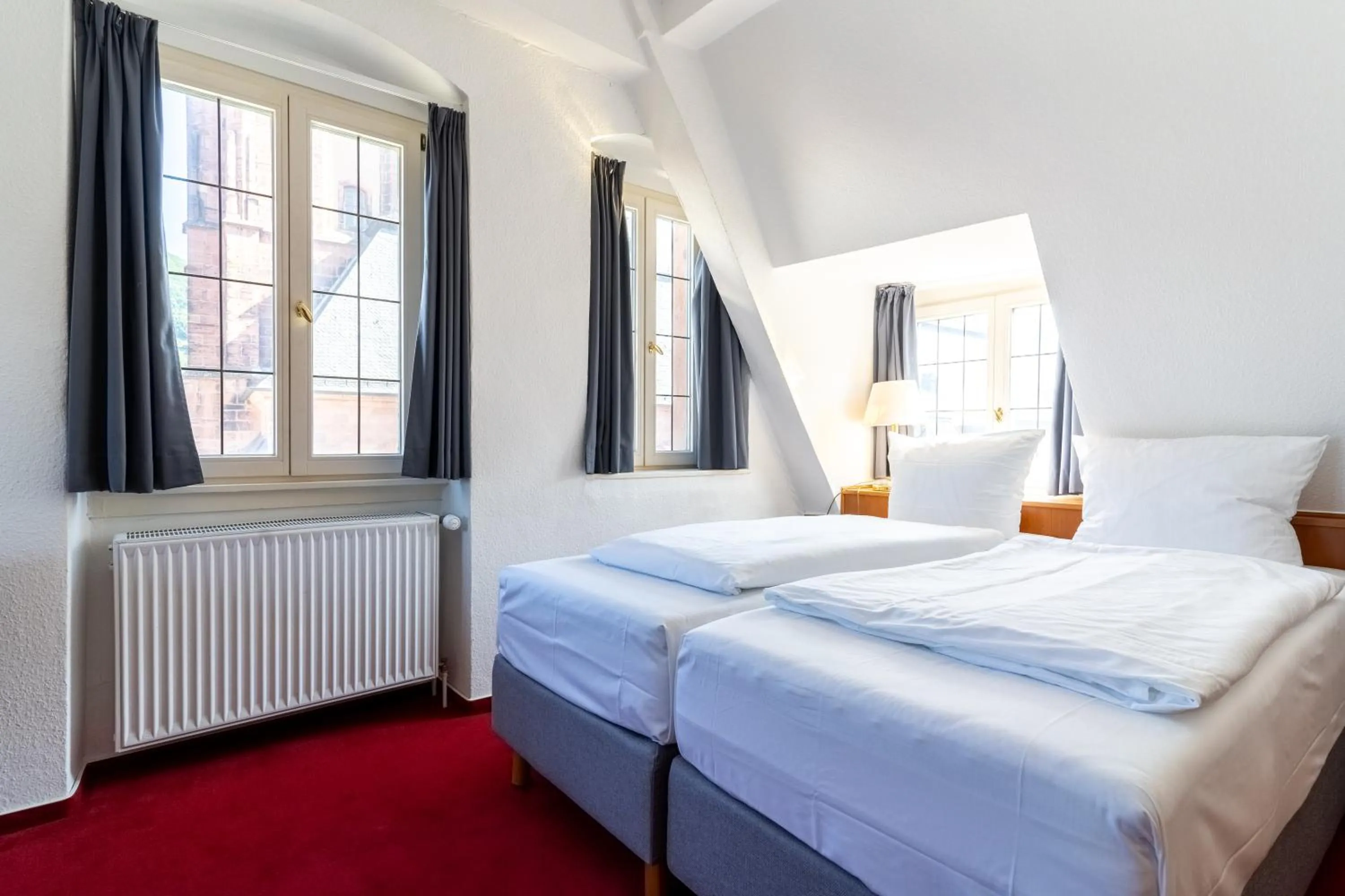 Bedroom, Bed in Hotel zum Ritter St Georg - Oldest Residential Building in Heidelberg since 1592
