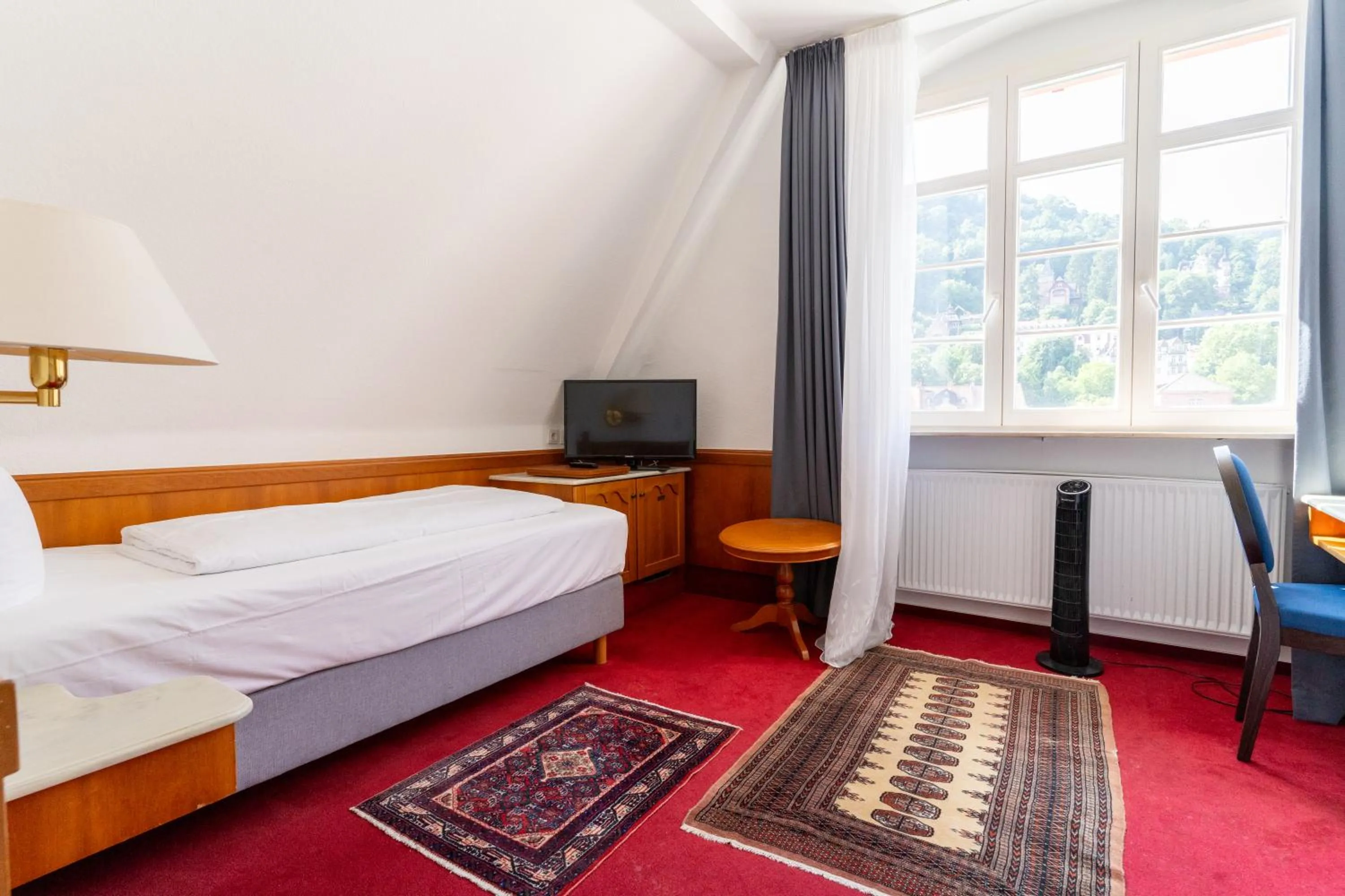 Communal lounge/ TV room, Bed in Hotel zum Ritter St Georg - Oldest Residential Building in Heidelberg since 1592