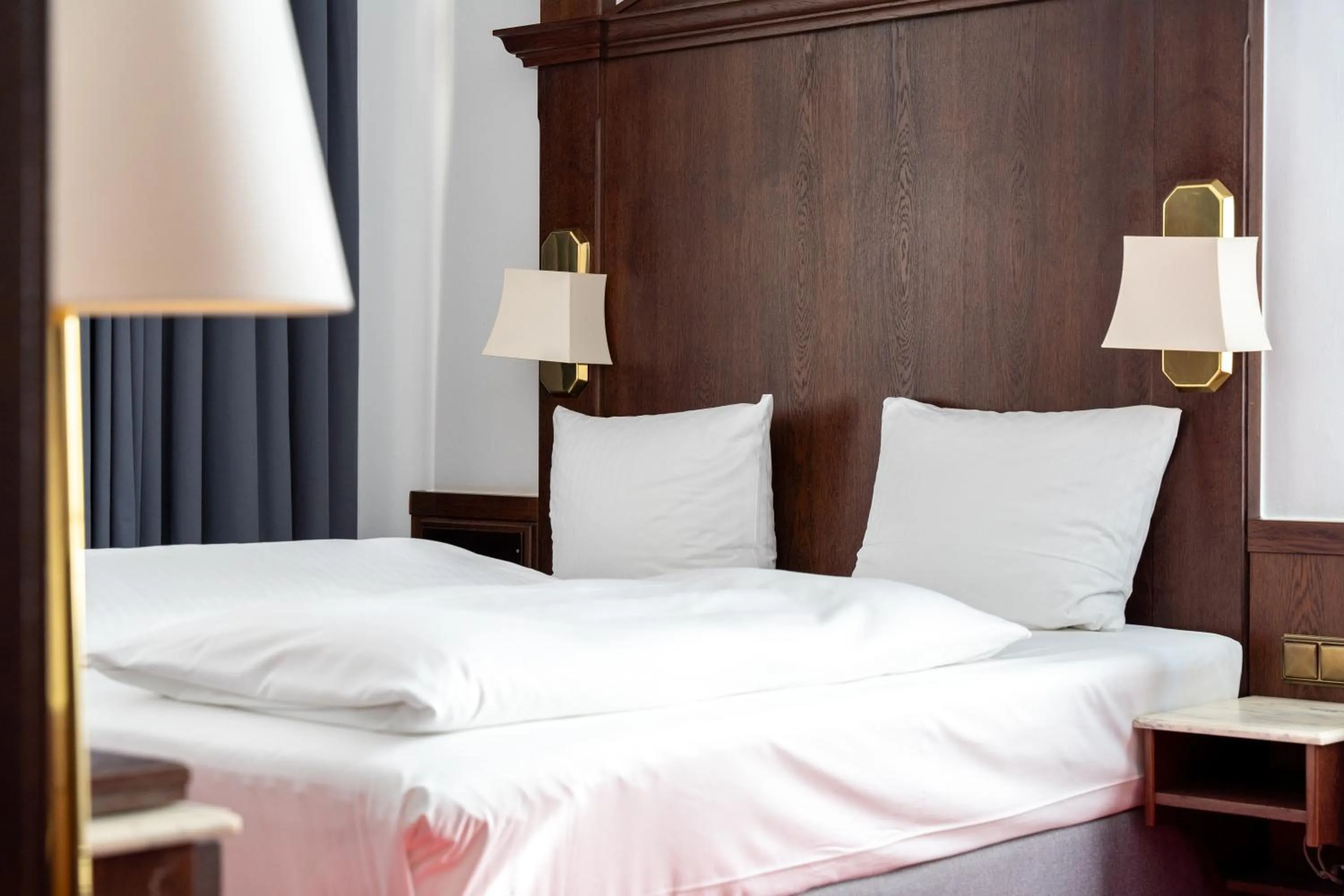 Bed in Hotel zum Ritter St Georg - Oldest Residential Building in Heidelberg since 1592