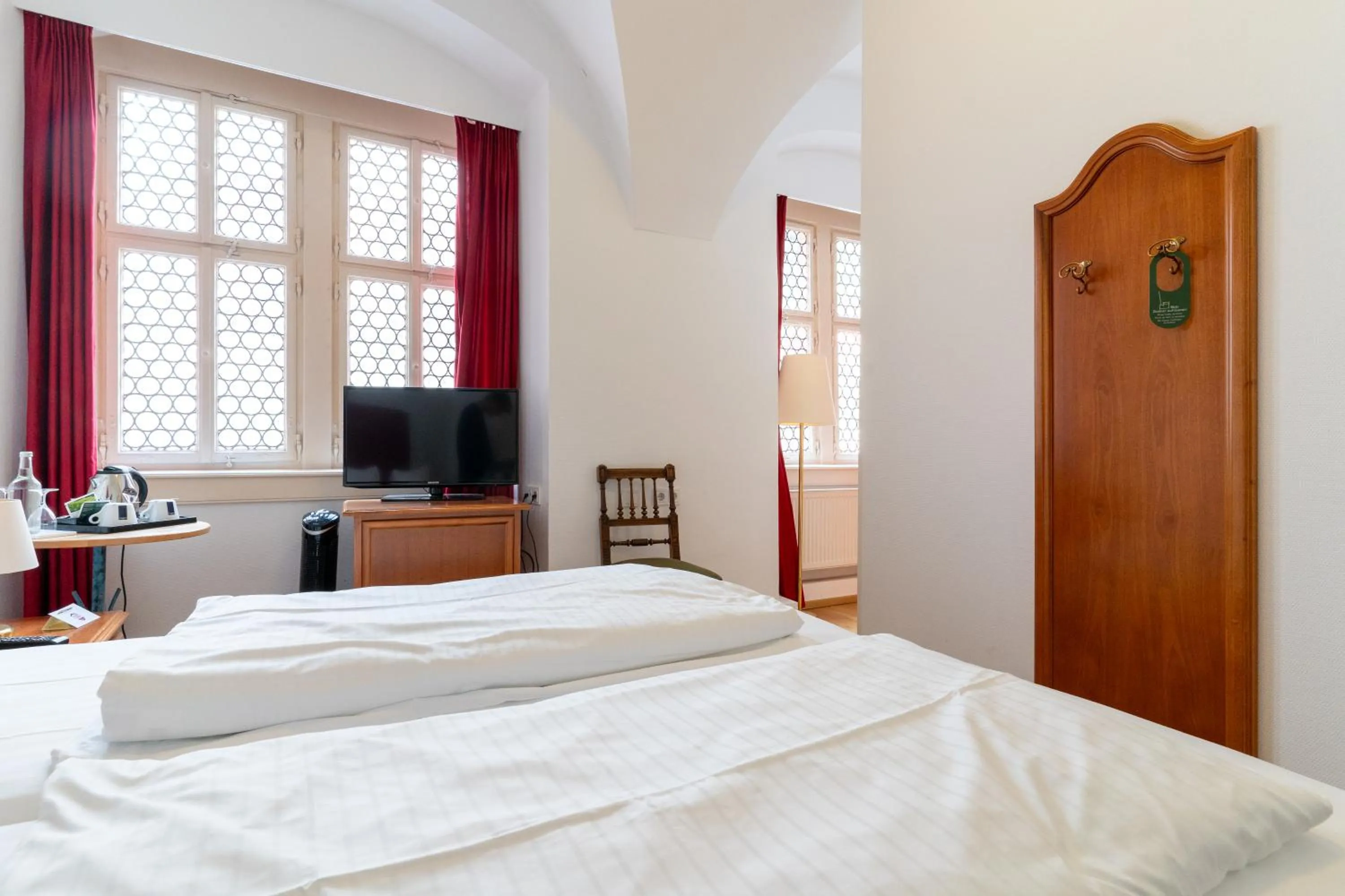 Communal lounge/ TV room, Bed in Hotel zum Ritter St Georg - Oldest Residential Building in Heidelberg since 1592