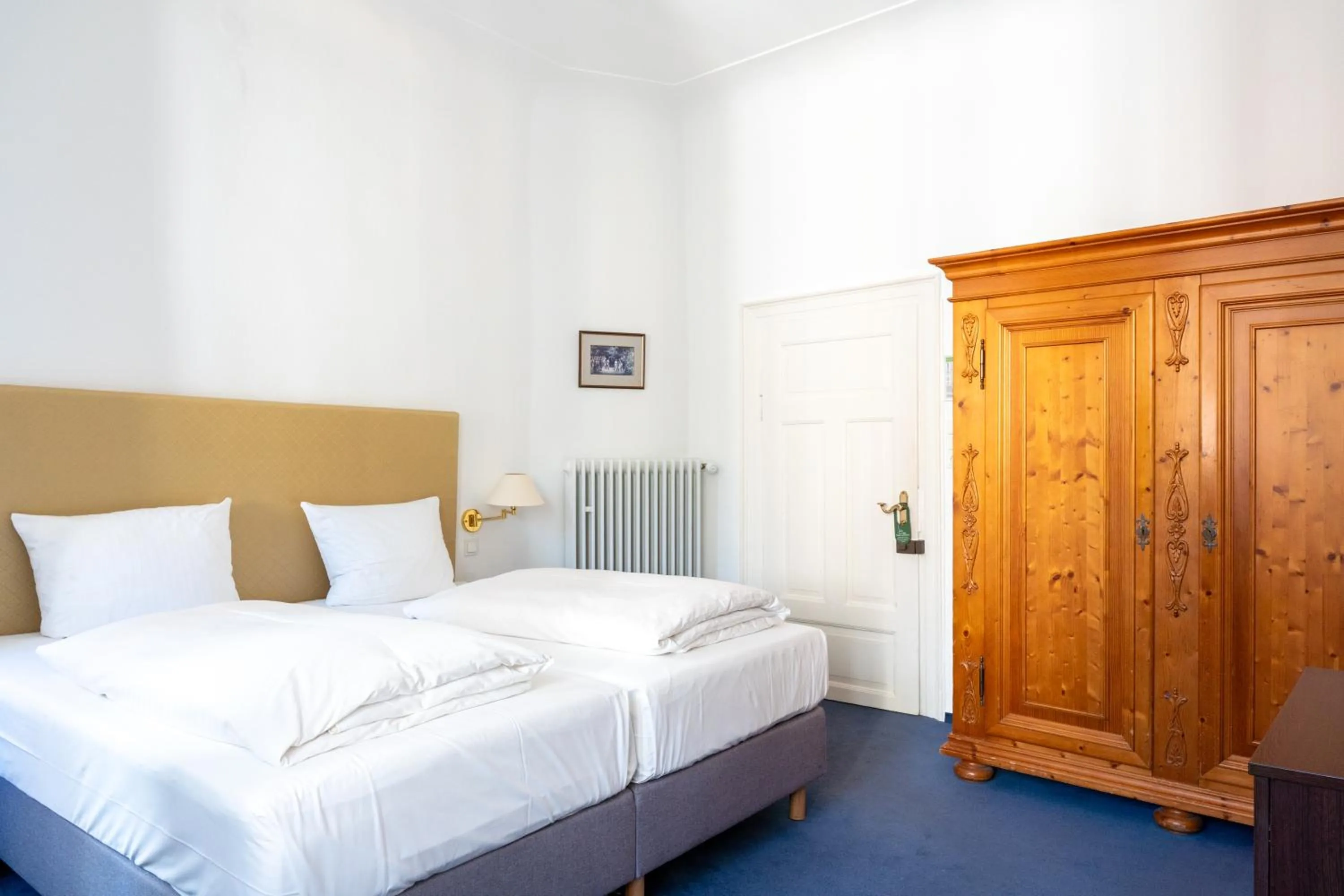 Bed in Hotel zum Ritter St Georg - Oldest Residential Building in Heidelberg since 1592