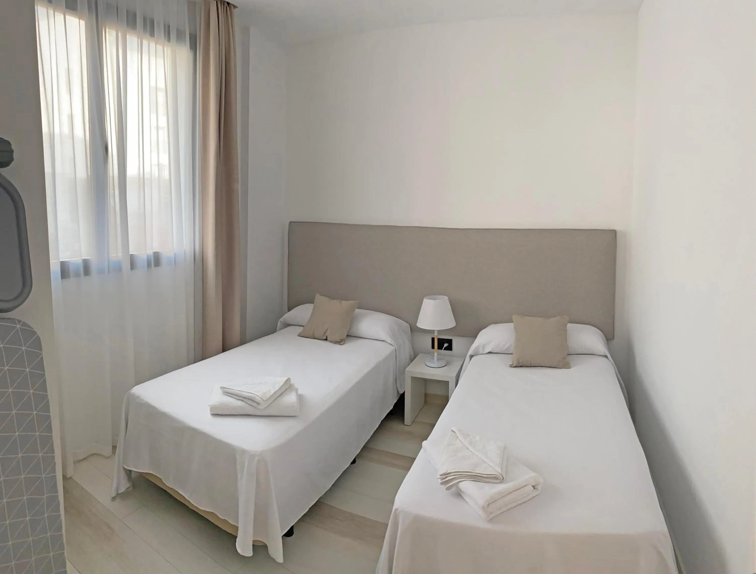 Bed in AZAHAR BEACH Red Apartments & Spa