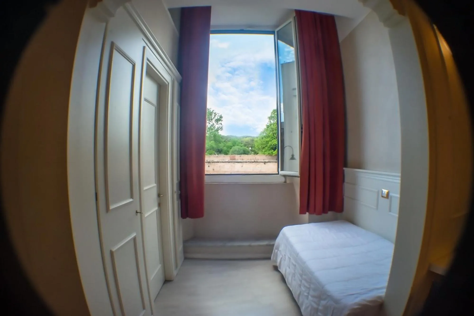 Bed in Hotel Ariston