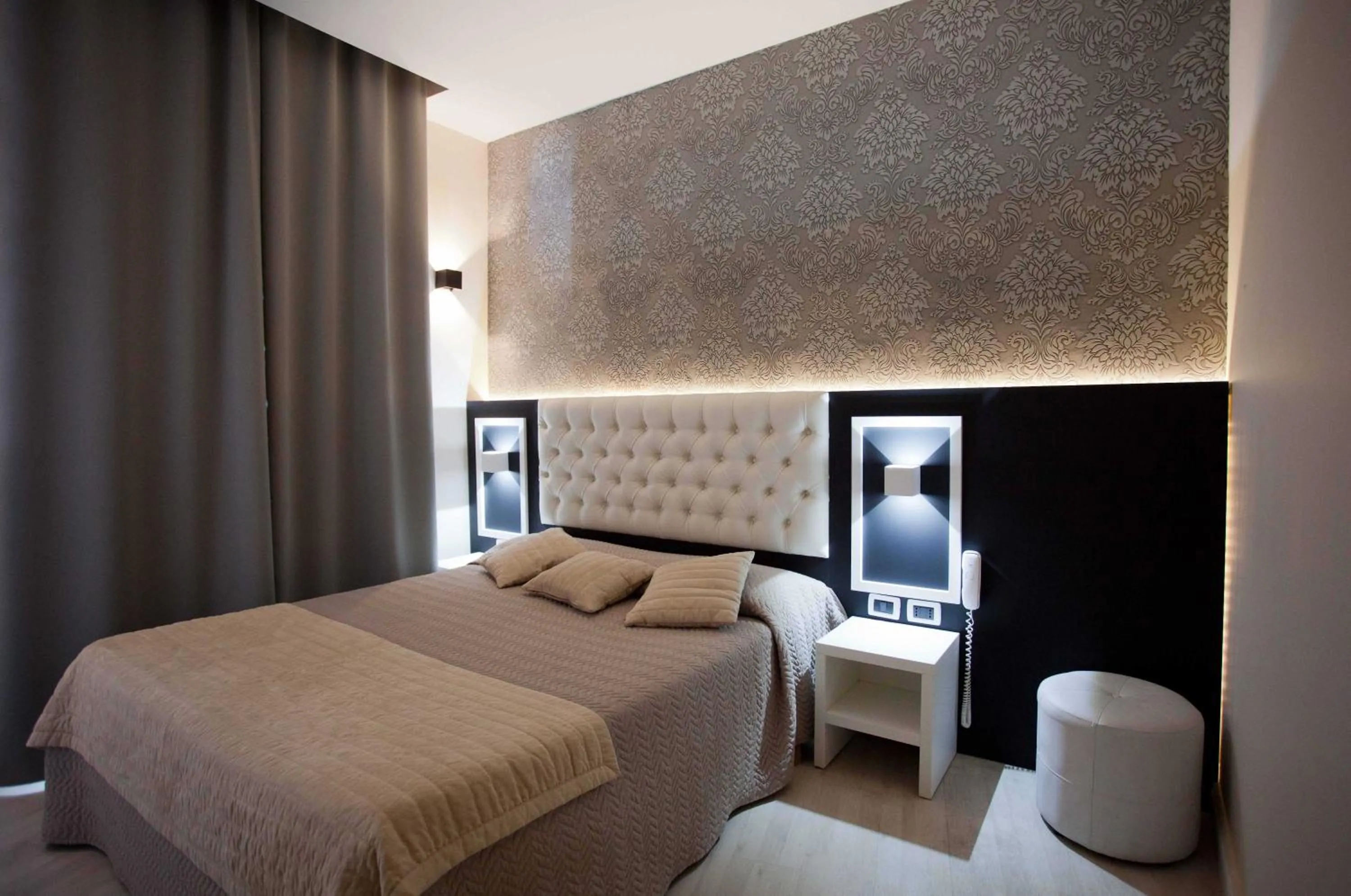 Bed in Hotel Ariston