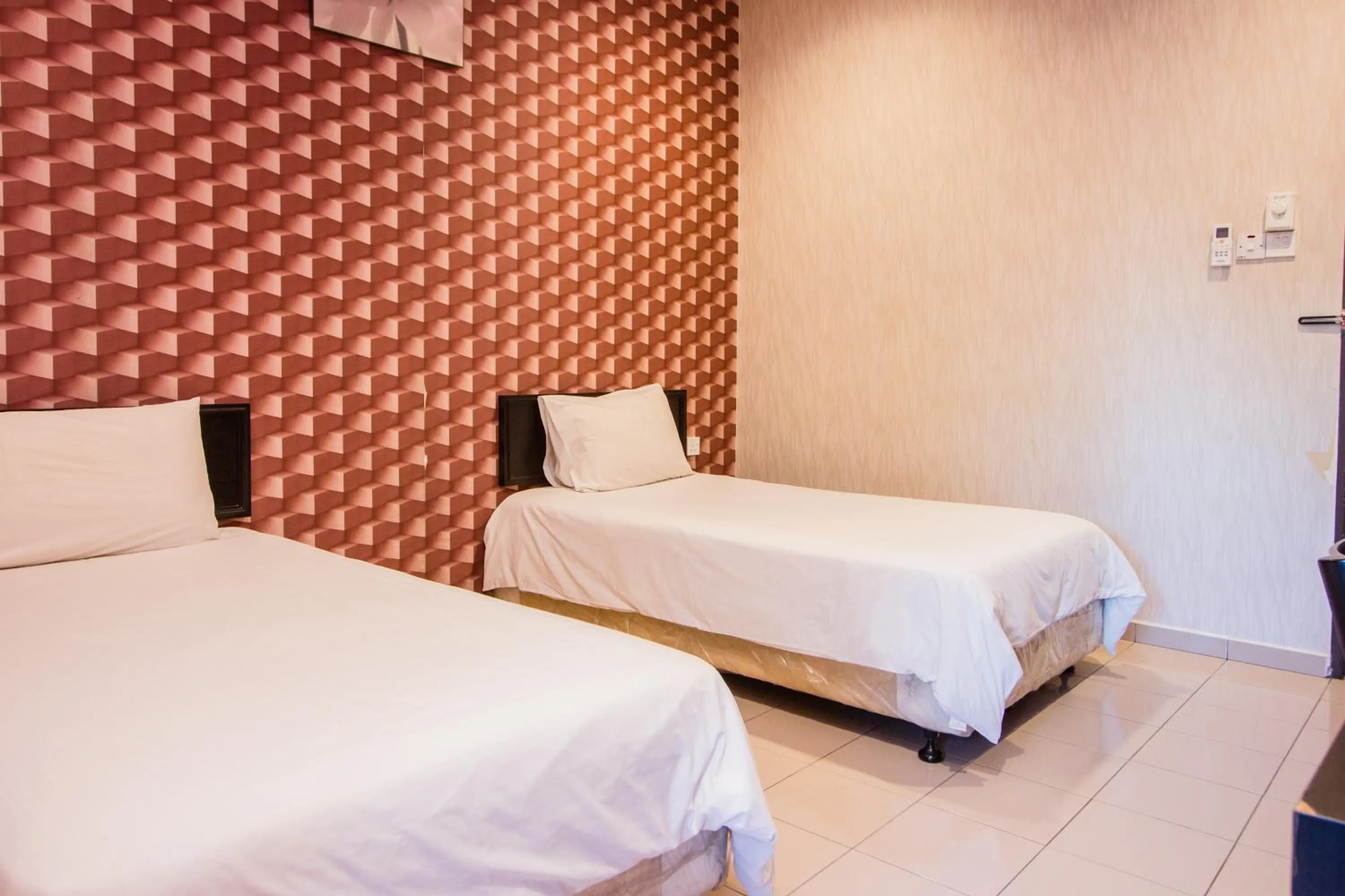 Bed in Value Inn Homestay